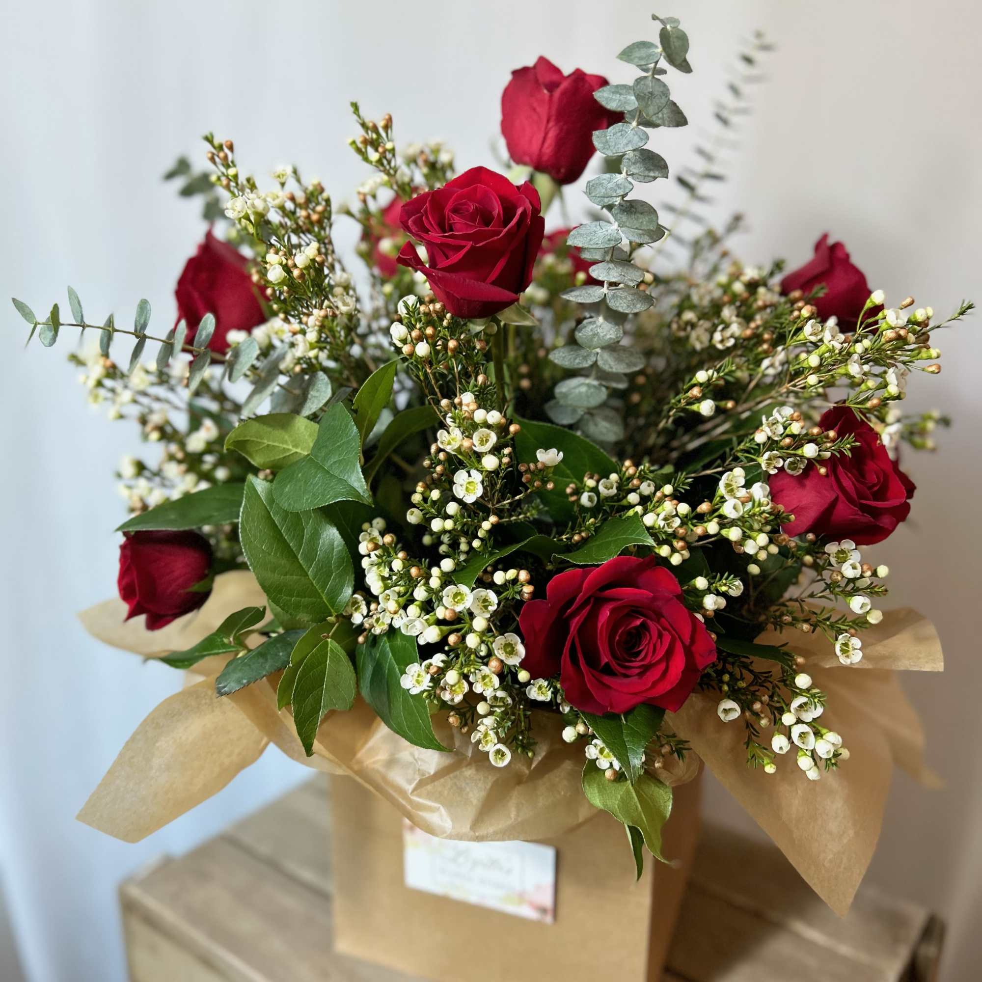 Classic roses beautifully arranged in a vase, perfect for birthdays, anniversaries, romance
