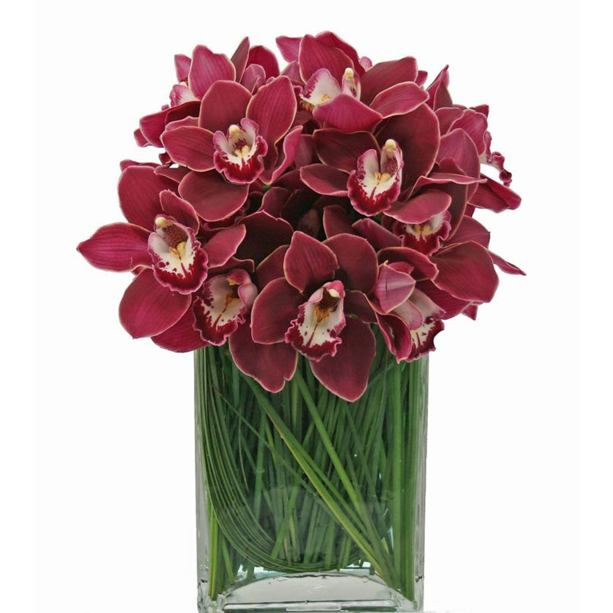Bouquet of deep red orchids in a clear glass vase