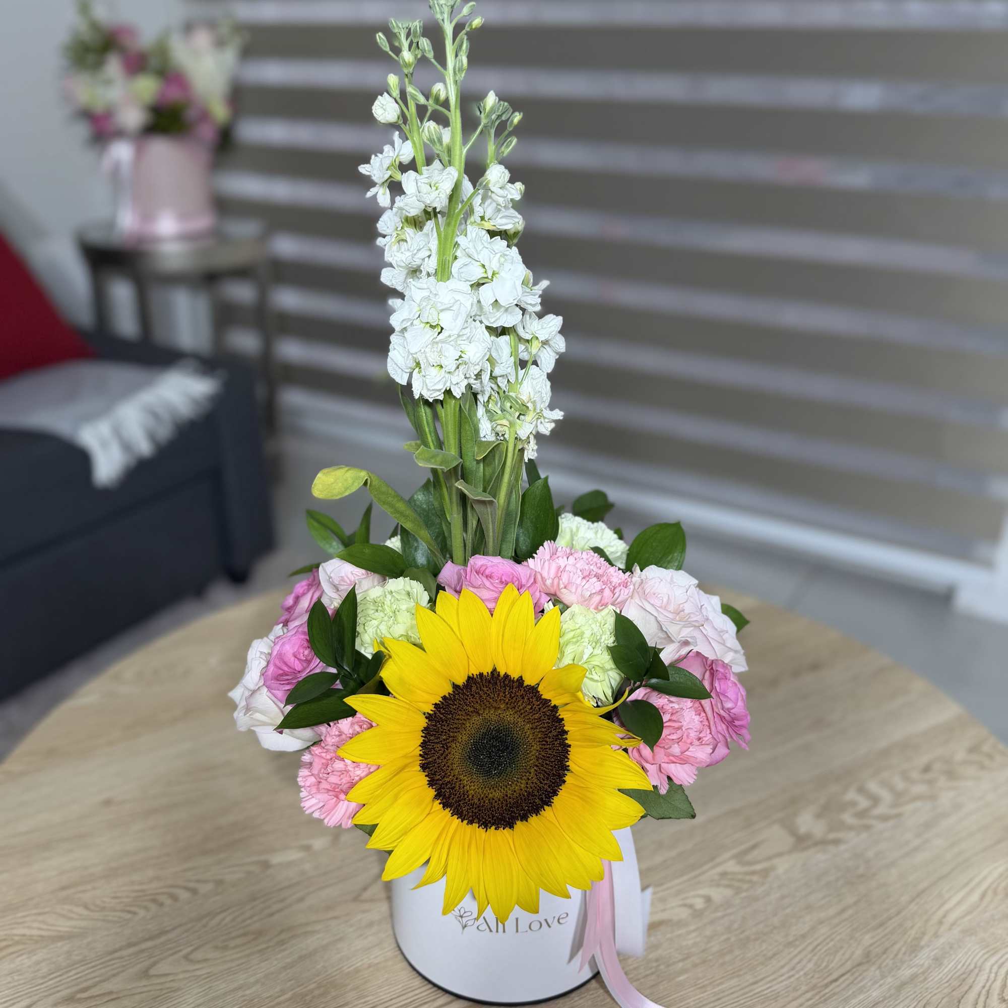 A Mother&rsquo;s Day arrangement made with so much love . Sunflowers, carnations