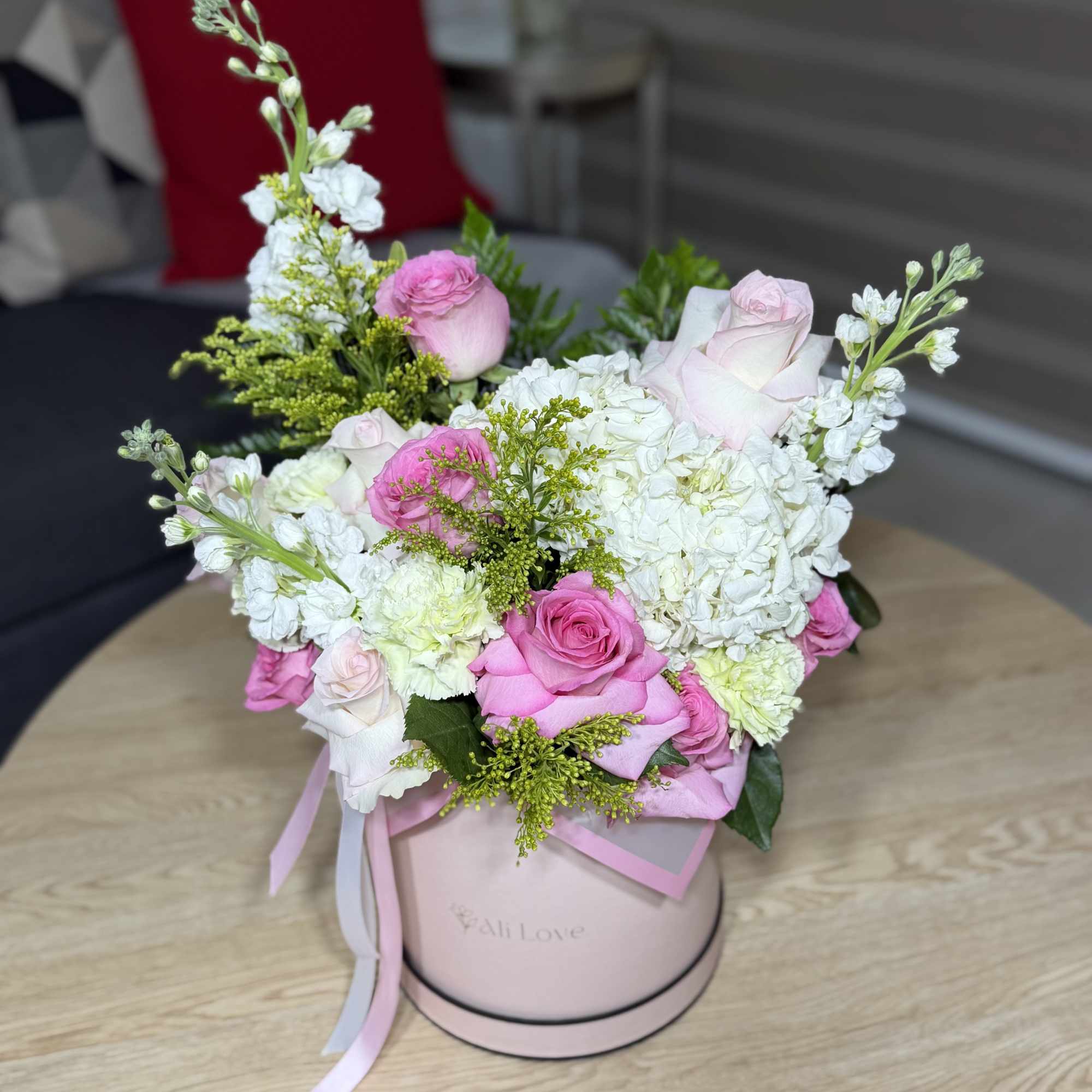 A gentle Mother&rsquo;s Day arrangement of hydrangeas, roses, and stock flowers. Delicate