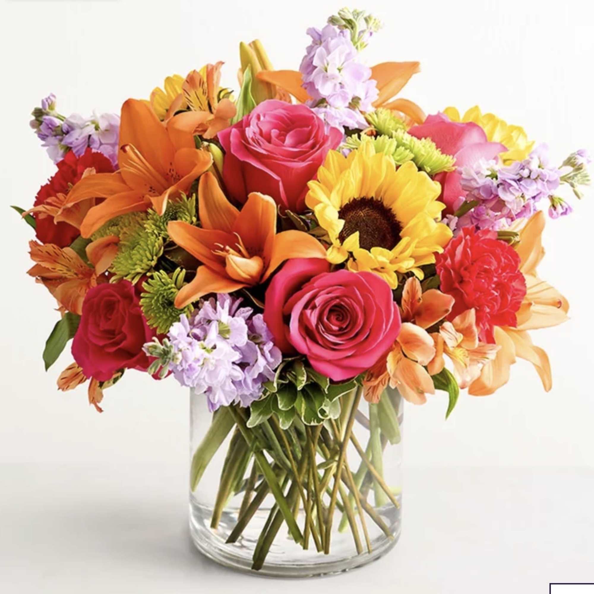 Like a warm embrace, this vibrant flower bouquet delivers your sentiments to