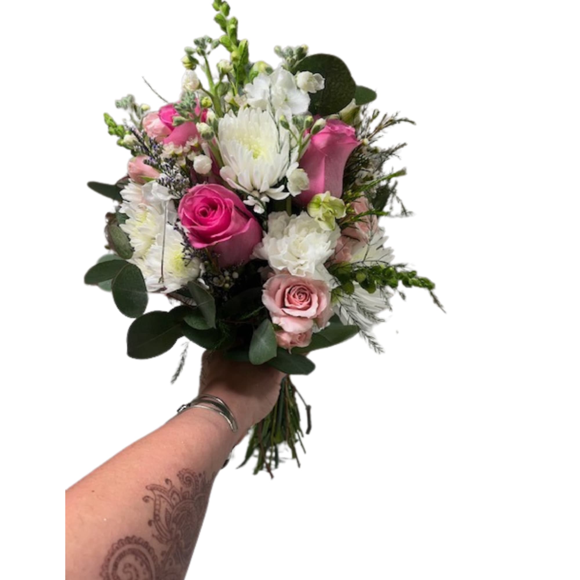 Handheld bouquet of pink and white flowers with greenery