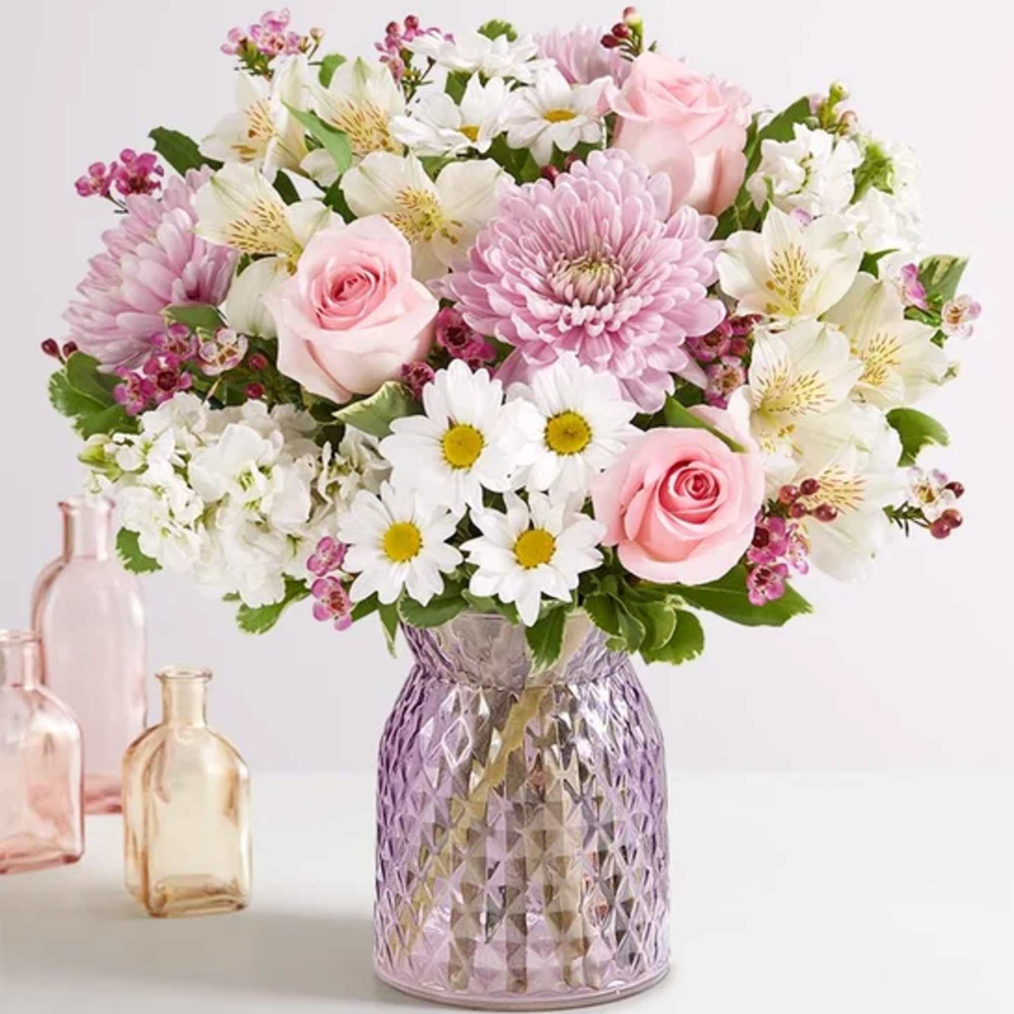 Pink, white and ready to delight every marvelous mom! Our sweet bouquet
