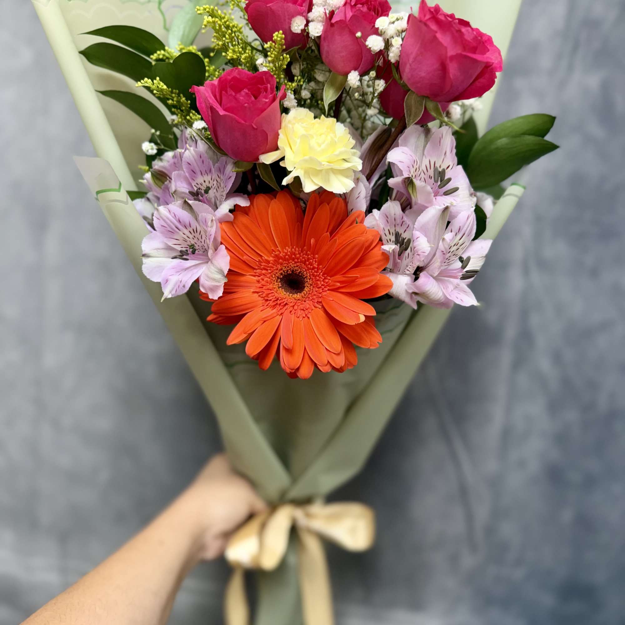 Vibrant spray roses and  gerbera with alstroemeria, carnations and white accents