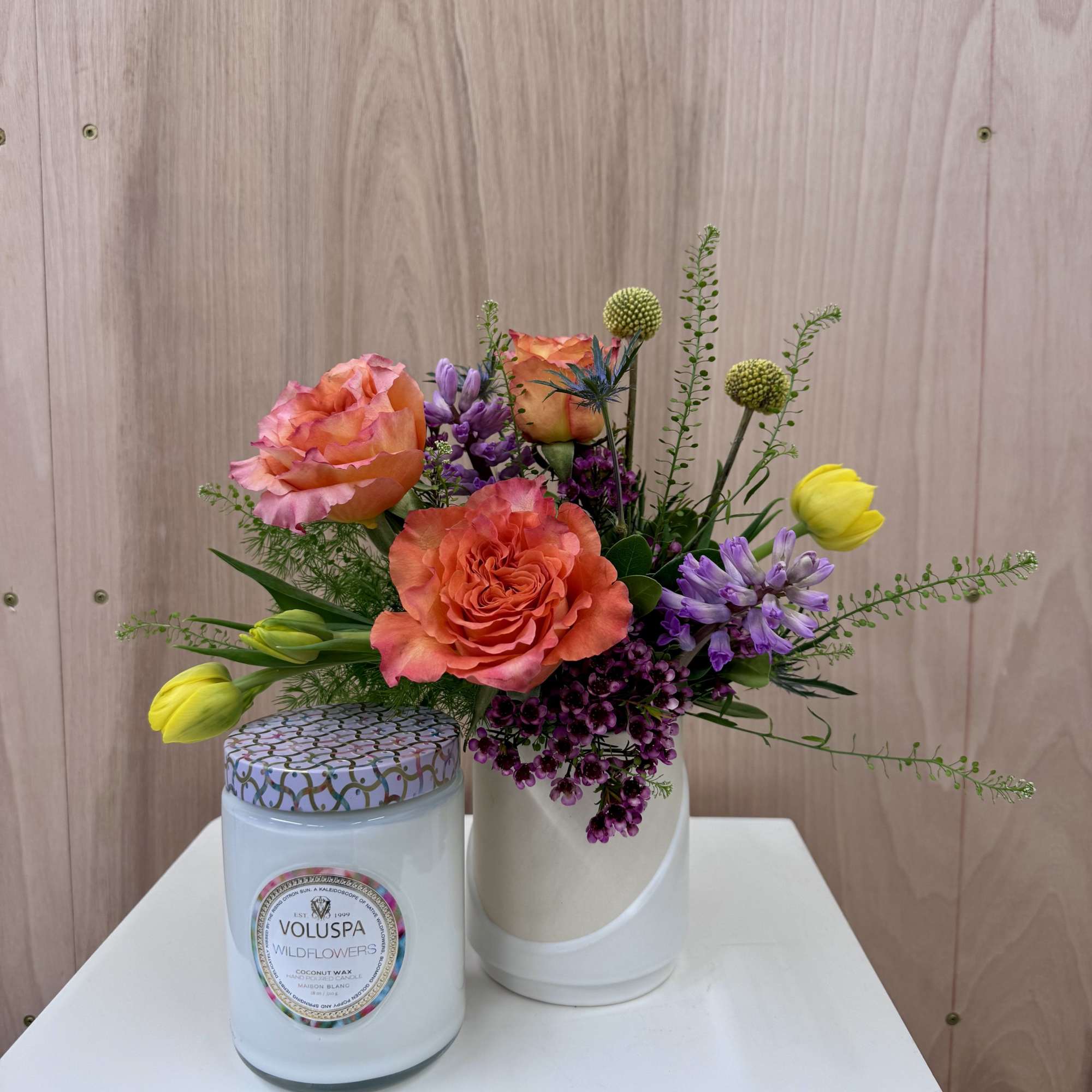 A wildflower inspired arrangement pairs beautifully with a wildflower scented candle (Voluspa's