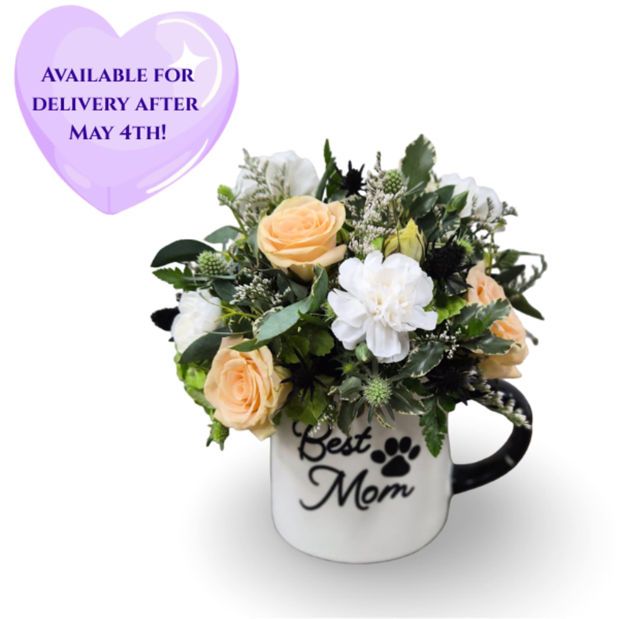 Peach roses and soft white blooms are arranged compactly in a white