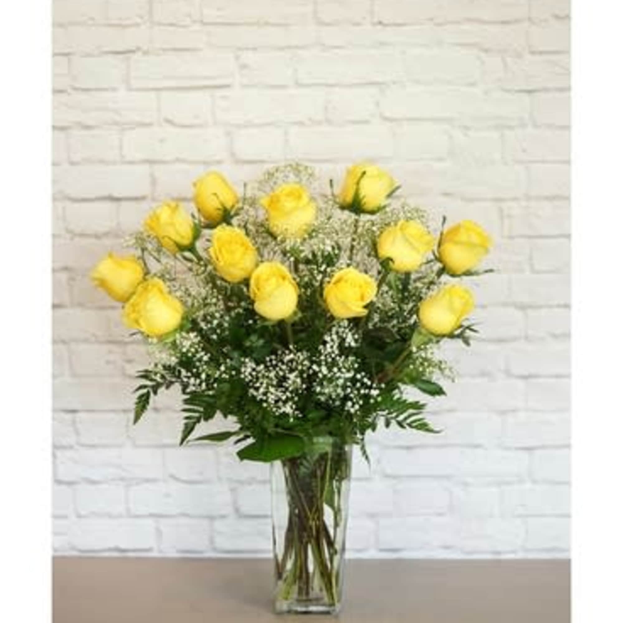 The Isabel Yellow rose is a fresh yellow rose that opens fully