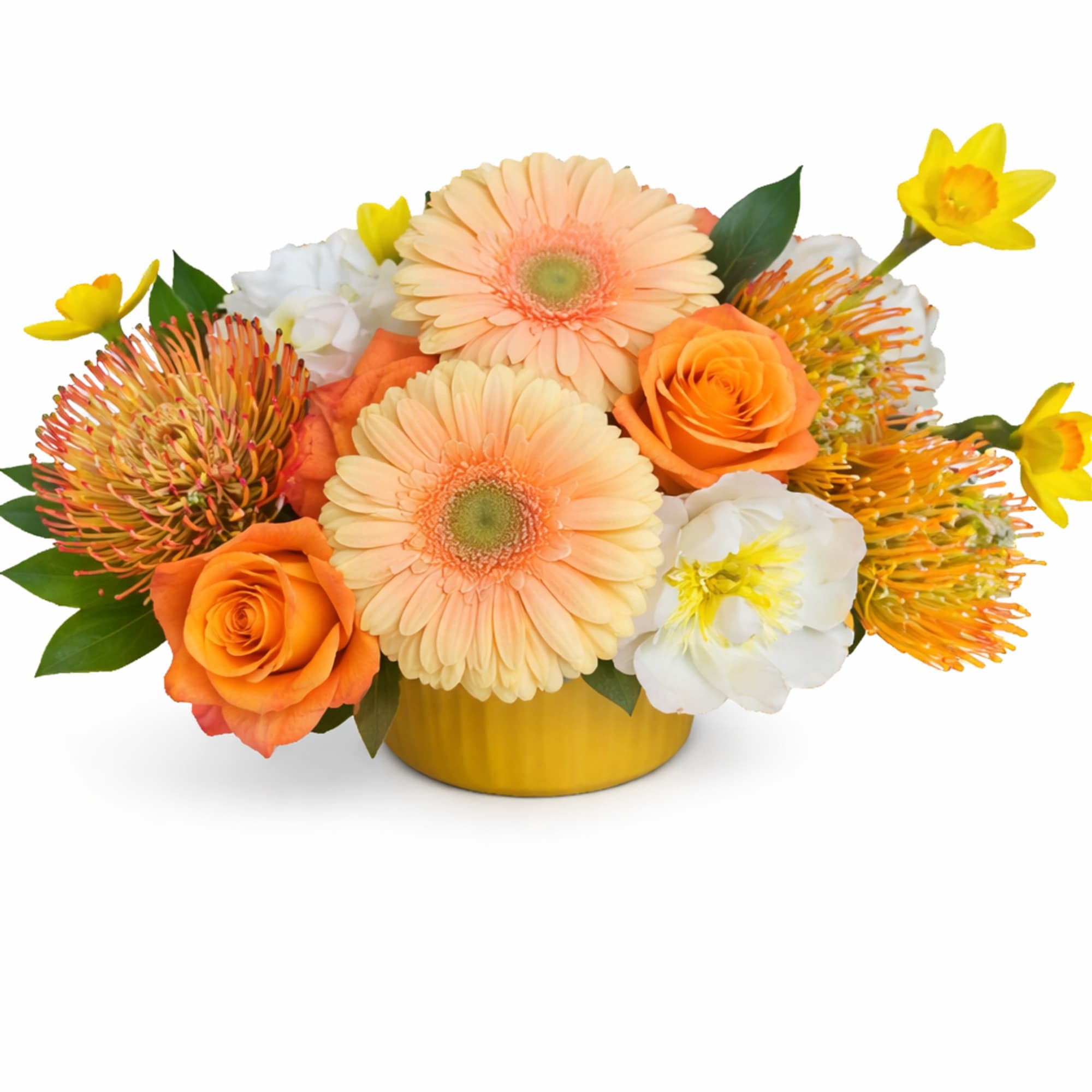 Peach gerbera daisies, peonies, hydrangea, protea, roses, and daffodils in a ceramic