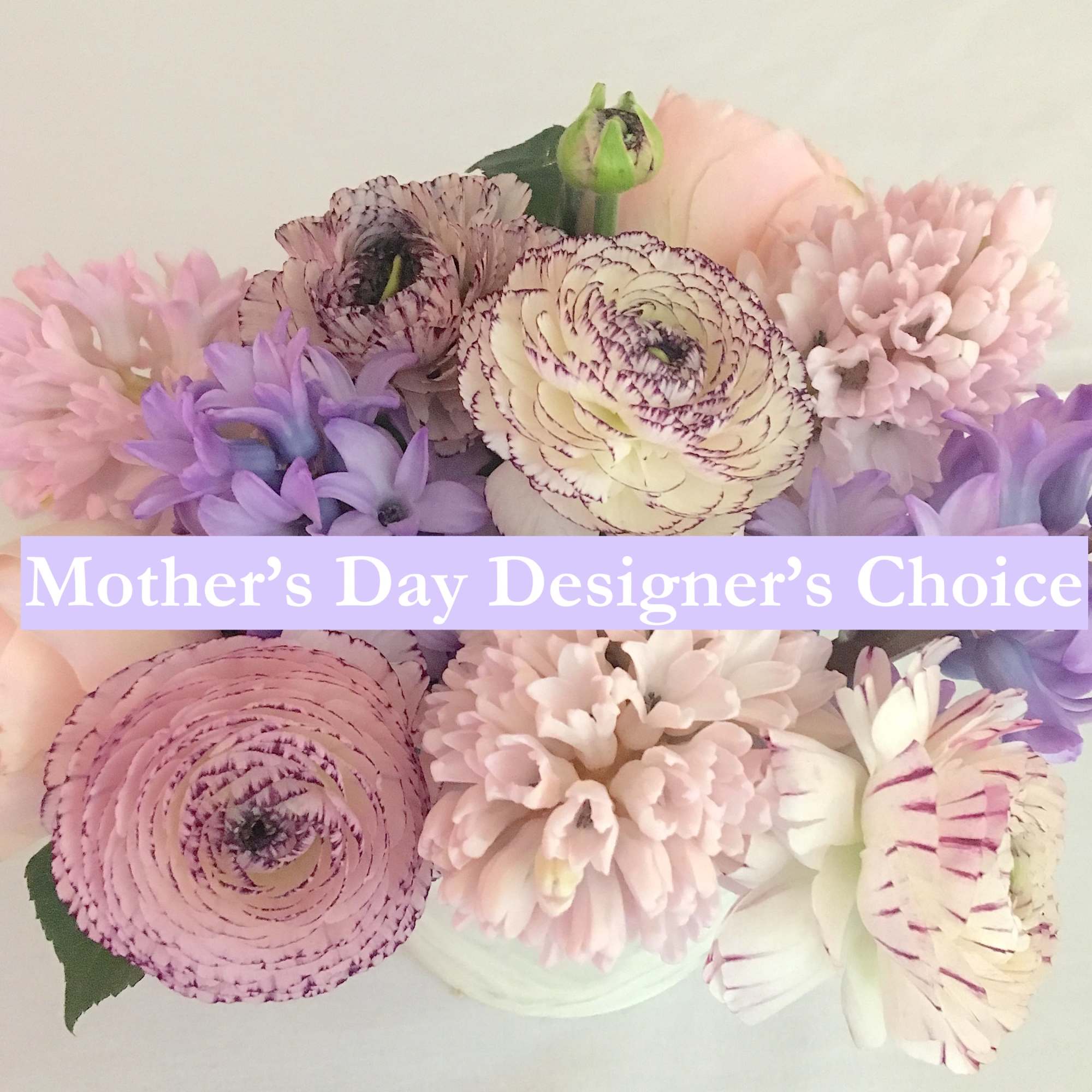 Pastel bouquet with pink, purple, and white flowers