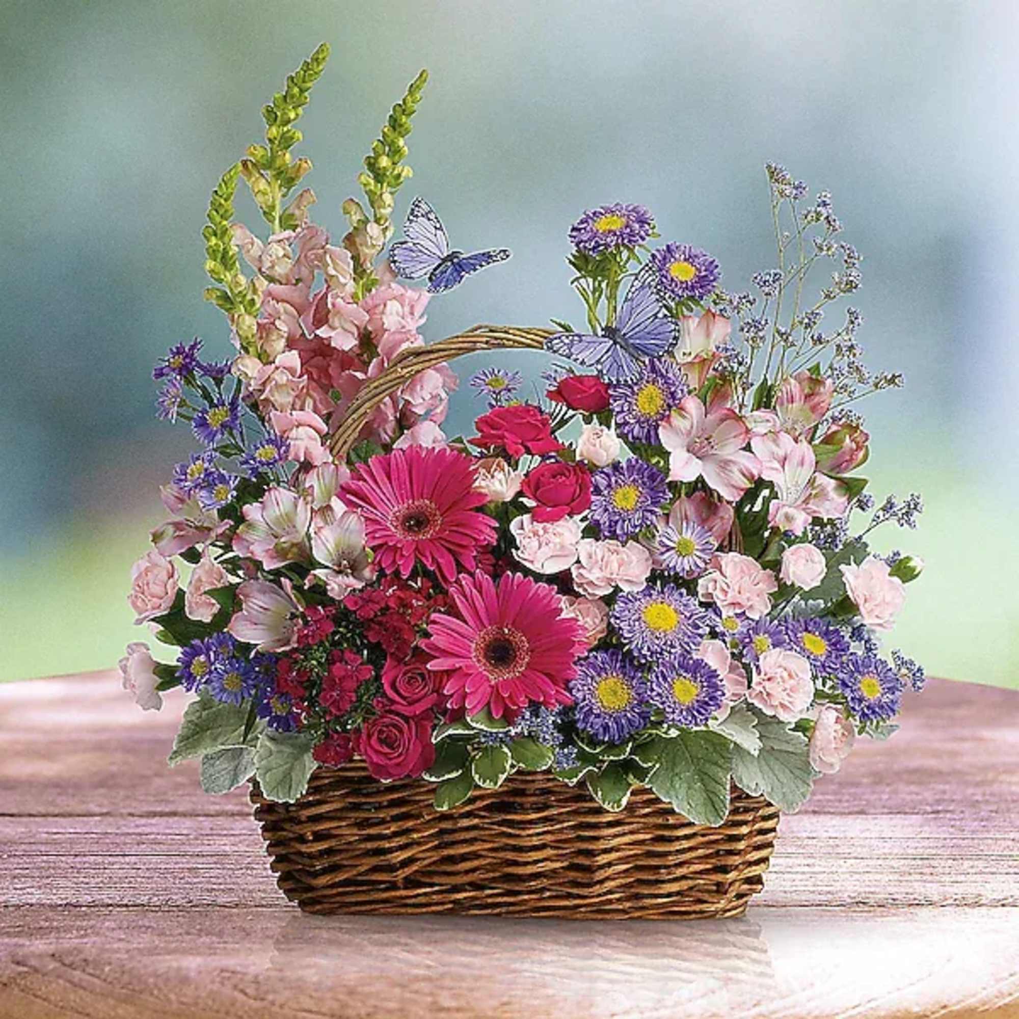 Talk about a bountiful basket! This wicker basket is overflowing with beauty