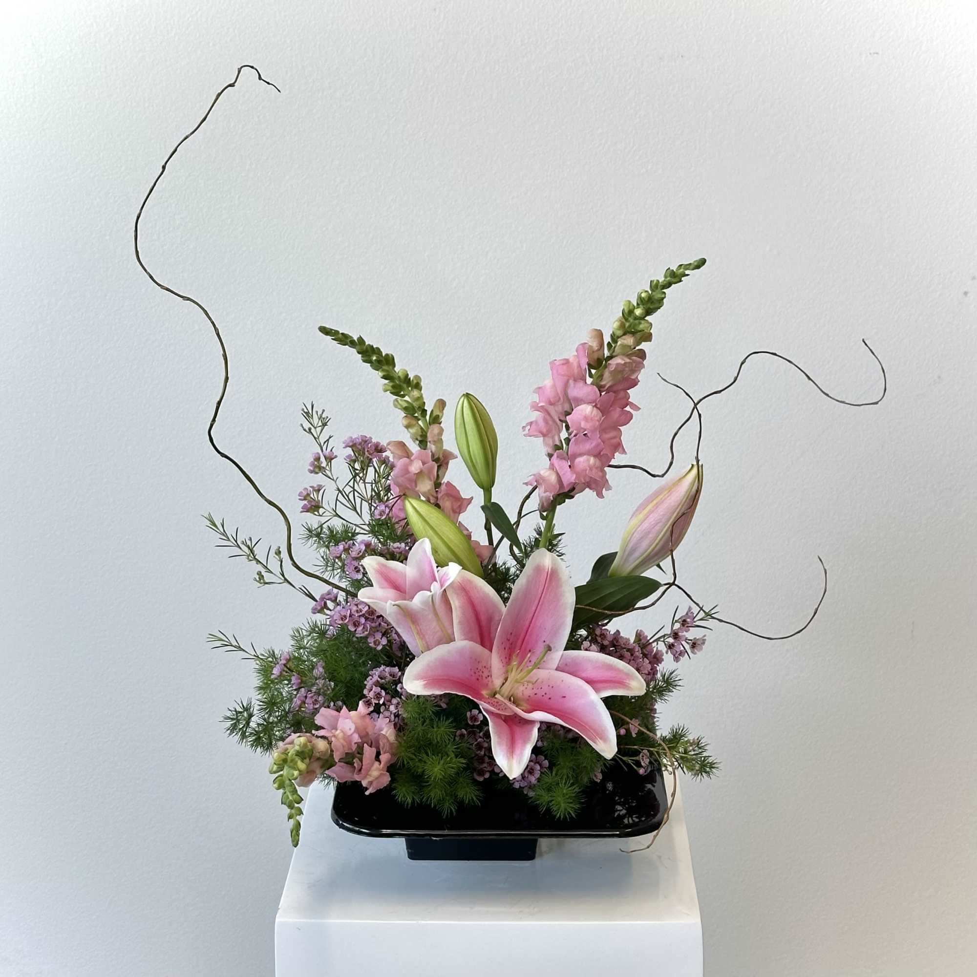 Discover the serene elegance of our Spring Blossom Ikebana-style arrangement, a harmonious