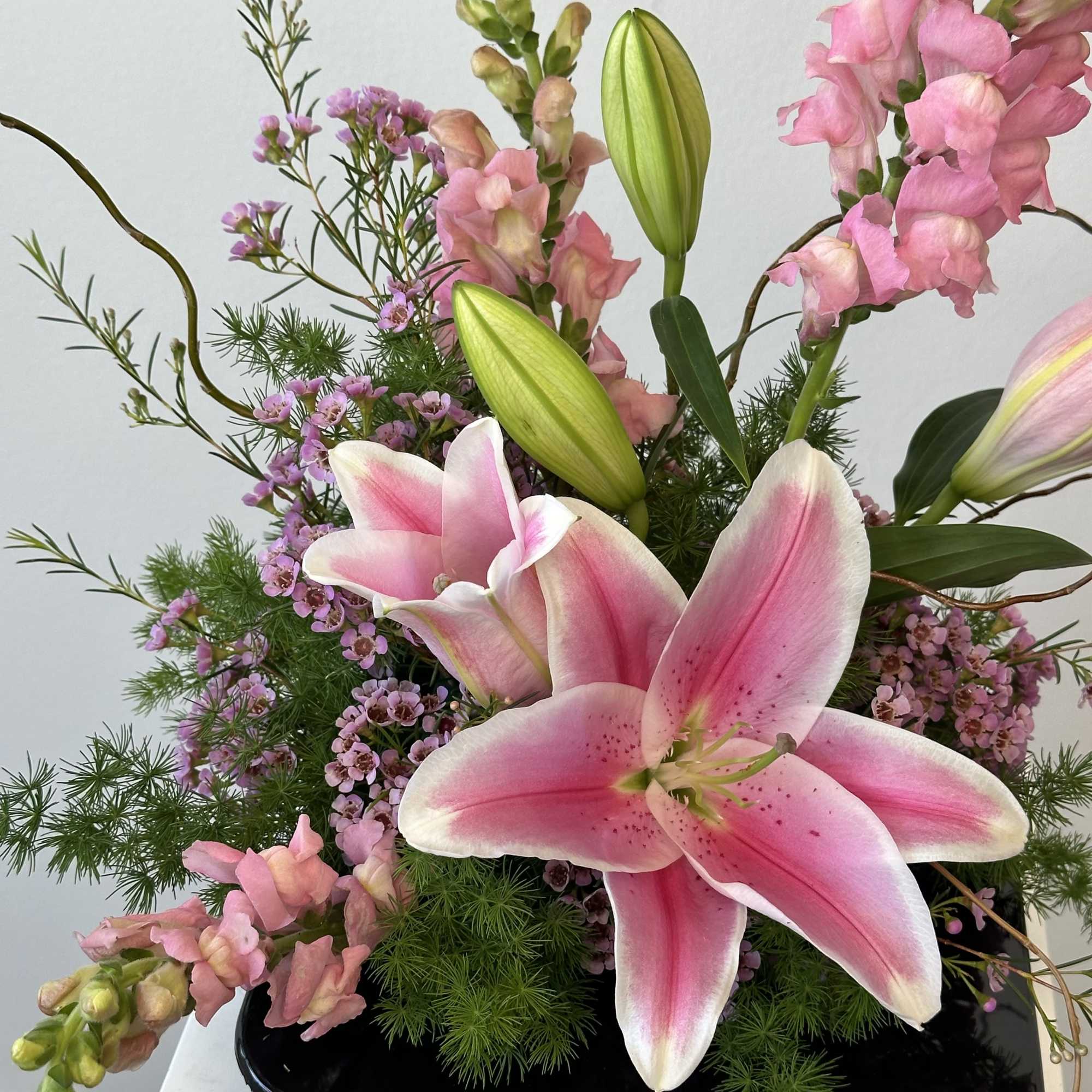 Discover the serene elegance of our Spring Blossom Ikebana-style arrangement, a harmonious