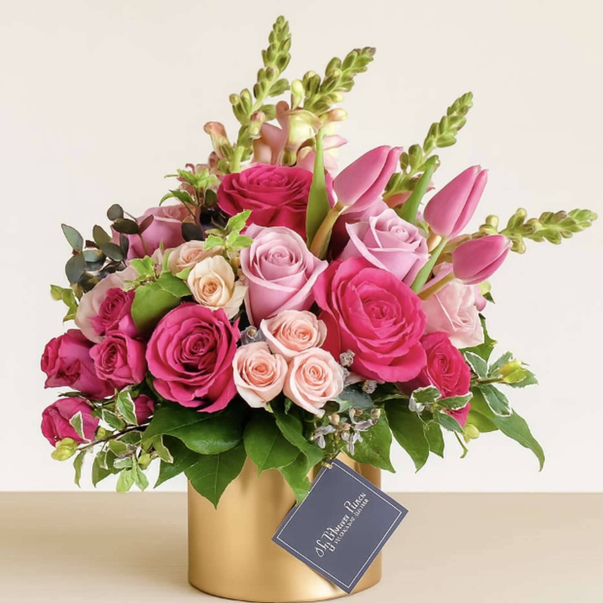 Shades of Pink Flower Arrangement in Gold Vase

Show someone special how much