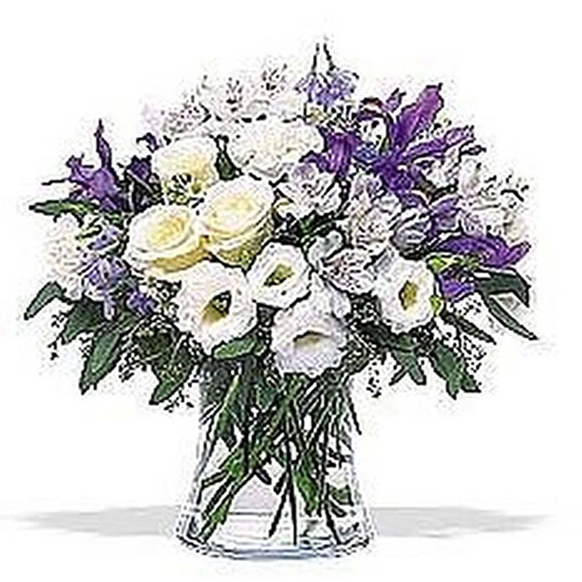 White and purple mixed flower arrangement in a clear glass vase