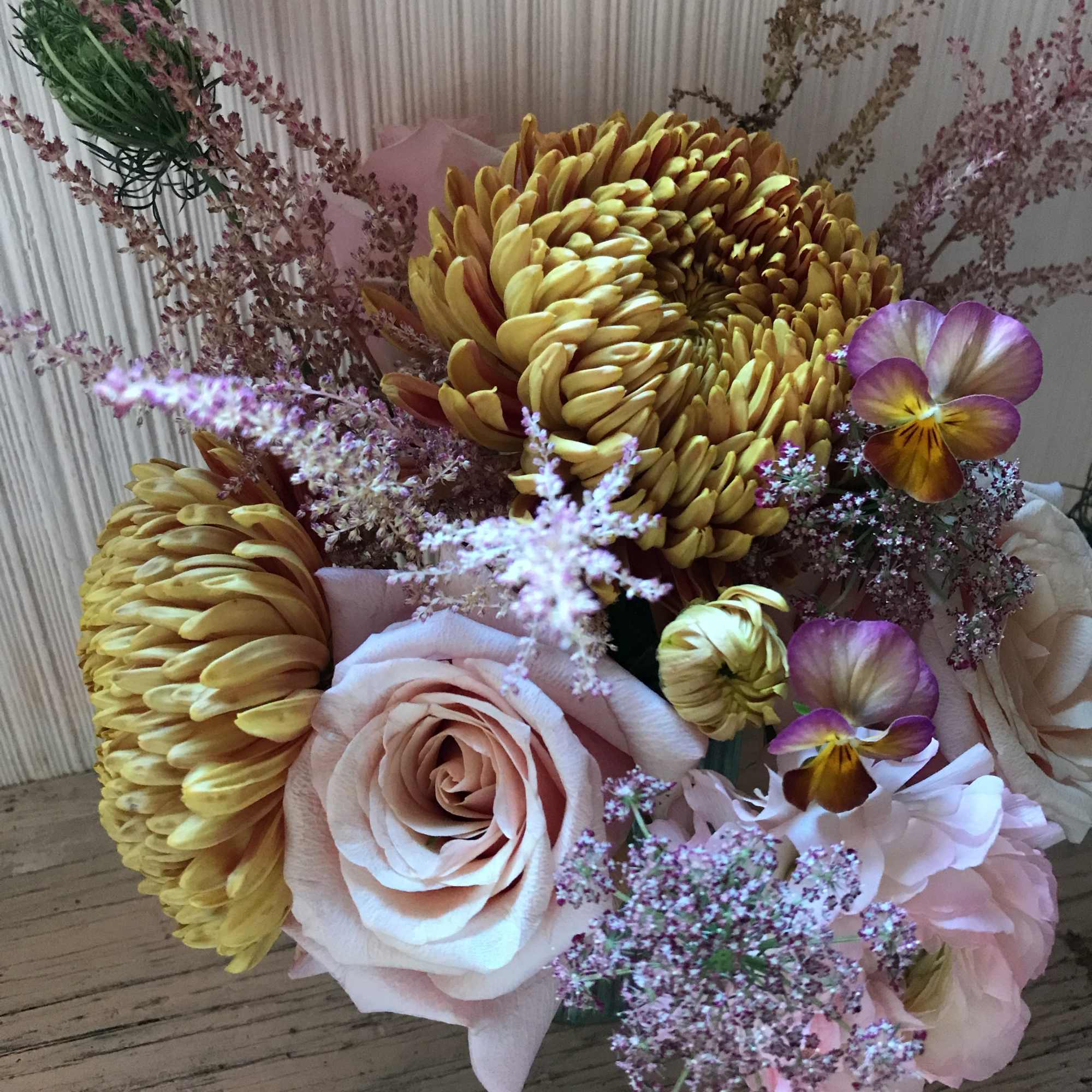 Make someone happy with the stylish arrangement of golden, dusty, blush colors