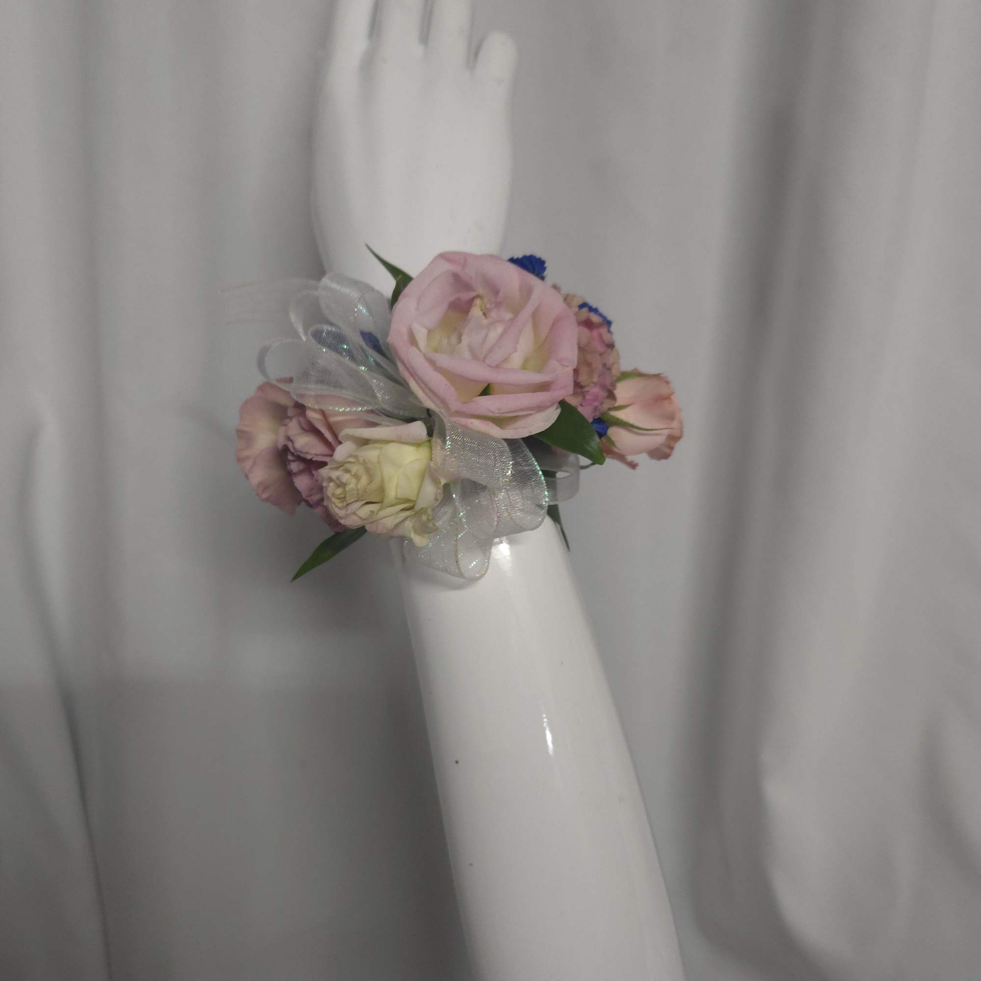 Custom corsages for your special day.