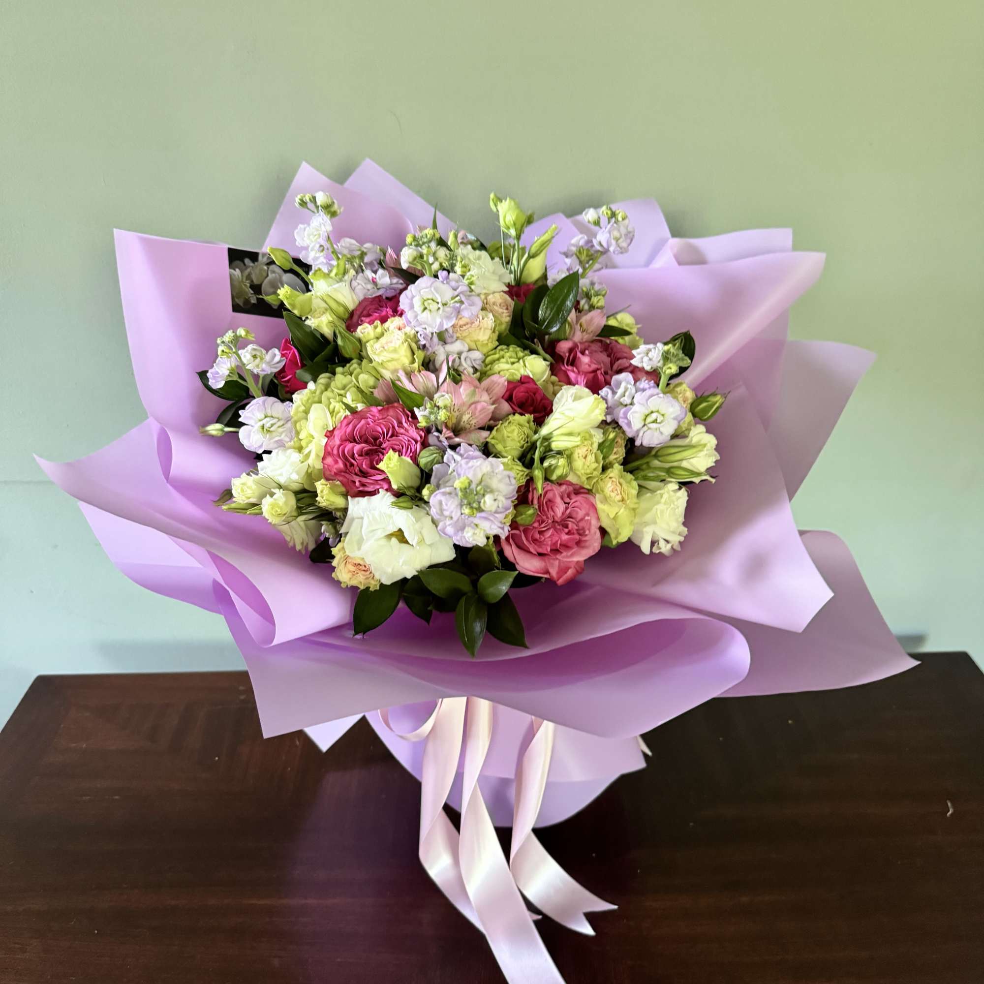 A soft, romantic hand-tied bouquet designed to make someone feel truly cherished