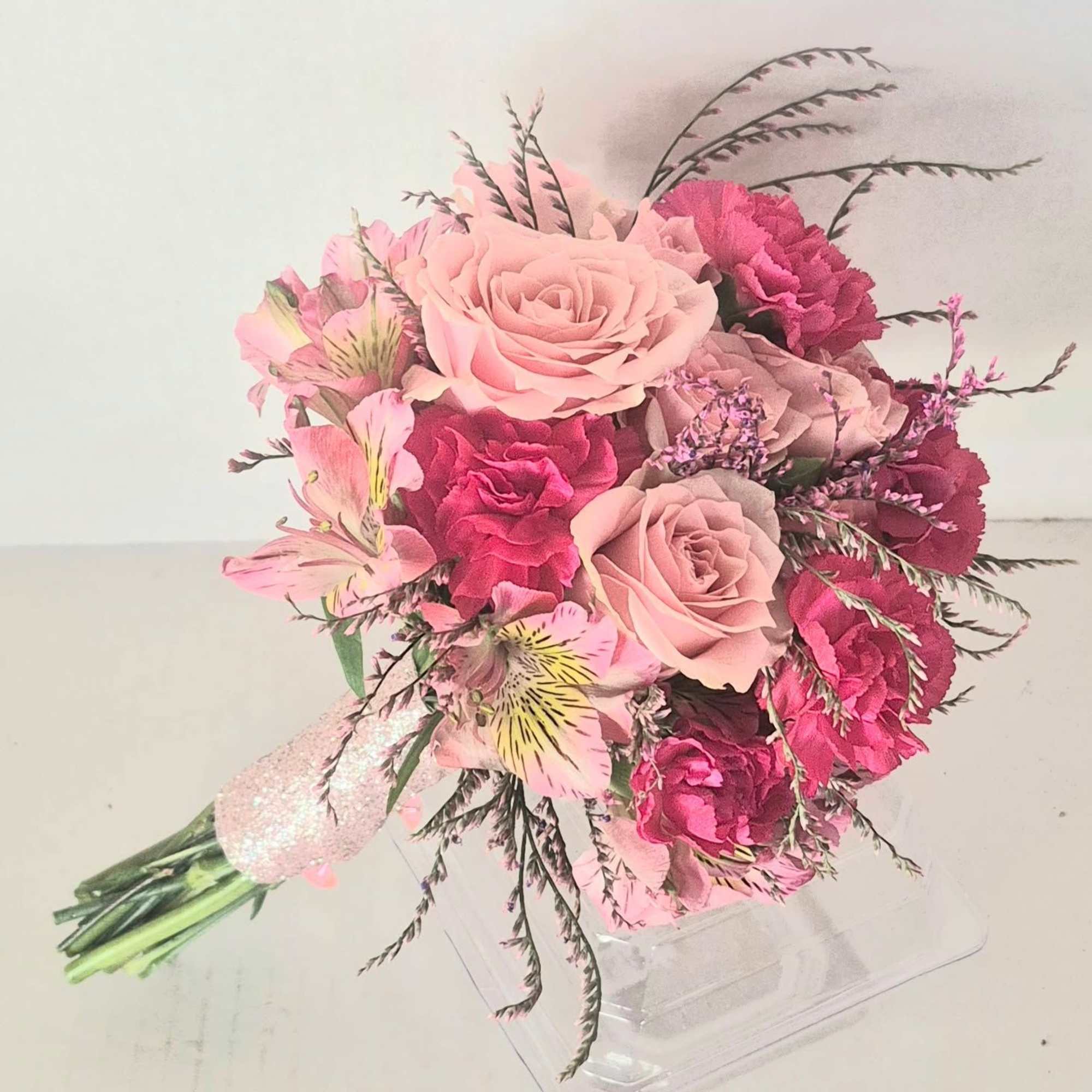 Handheld bouquet for prom, graduations or simple weddings