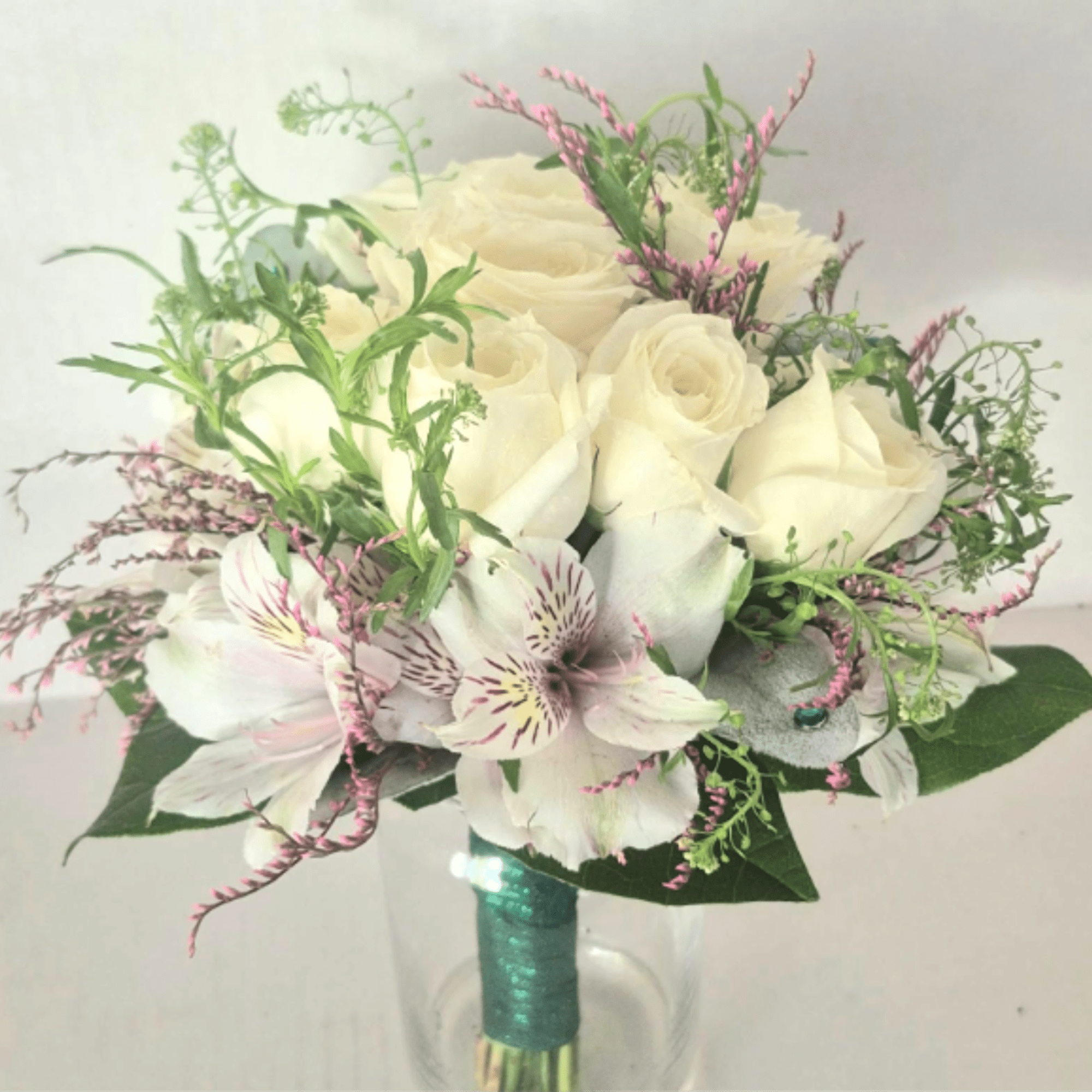 Handheld bouquet for prom, graduations or simple weddings
