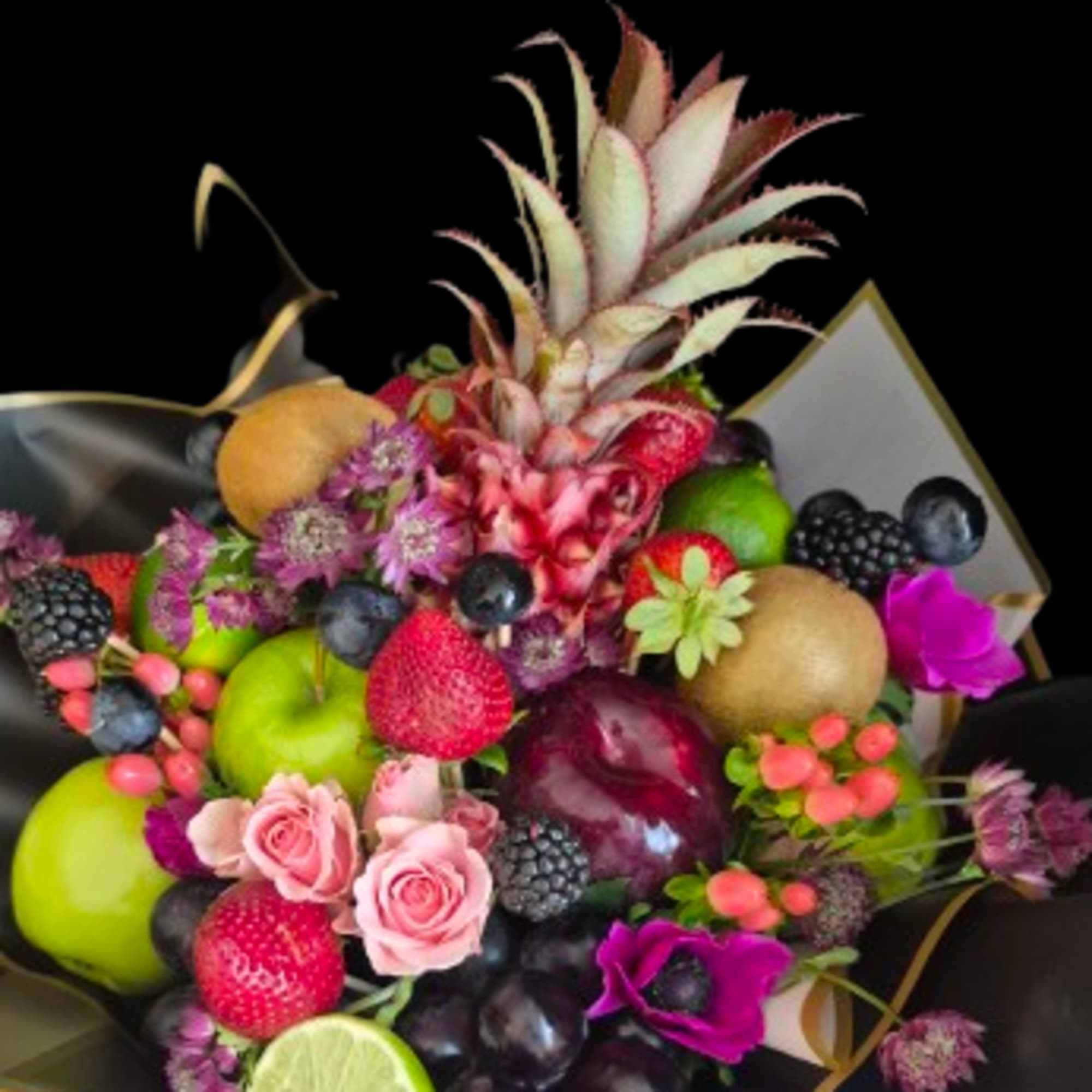A playful, gift-like flower arrangement that reads as an abundant edible surprise-perfect
