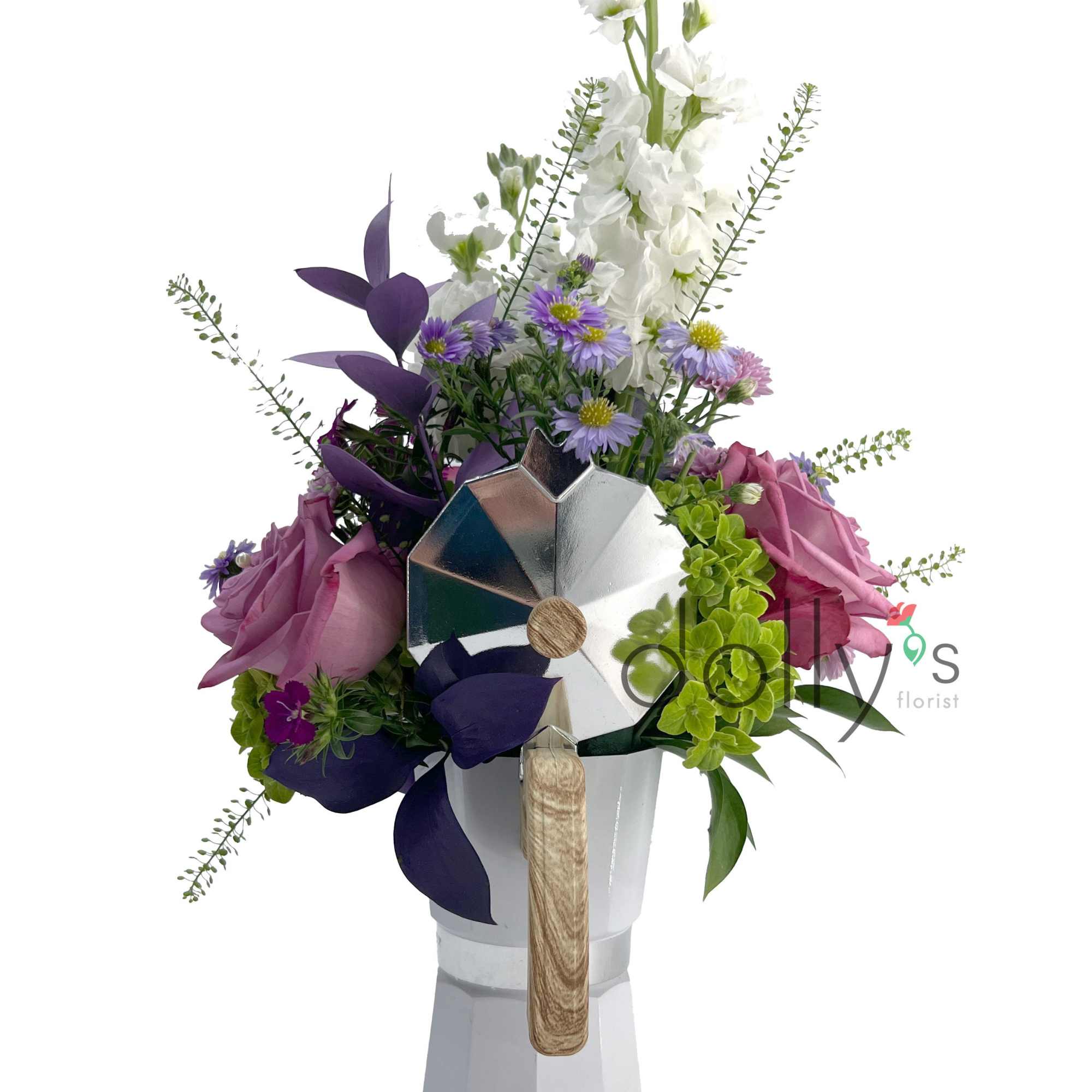 Purple and white floral arrangement in a white vase with a metallic accent