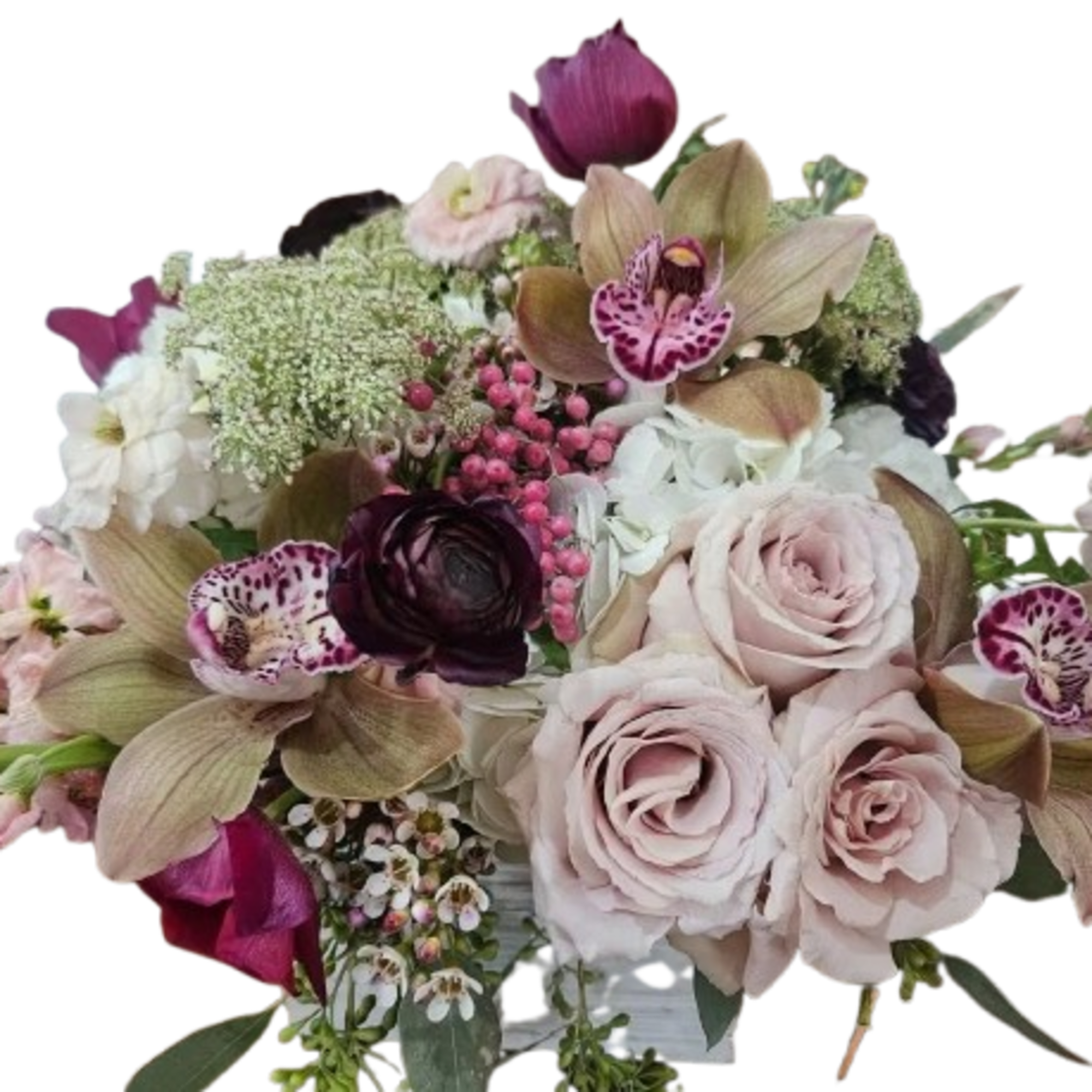 Roses, cymbidium orchids, hydrangea, pink stock, ranunculus, tulips, wax flower, berries, seeded
