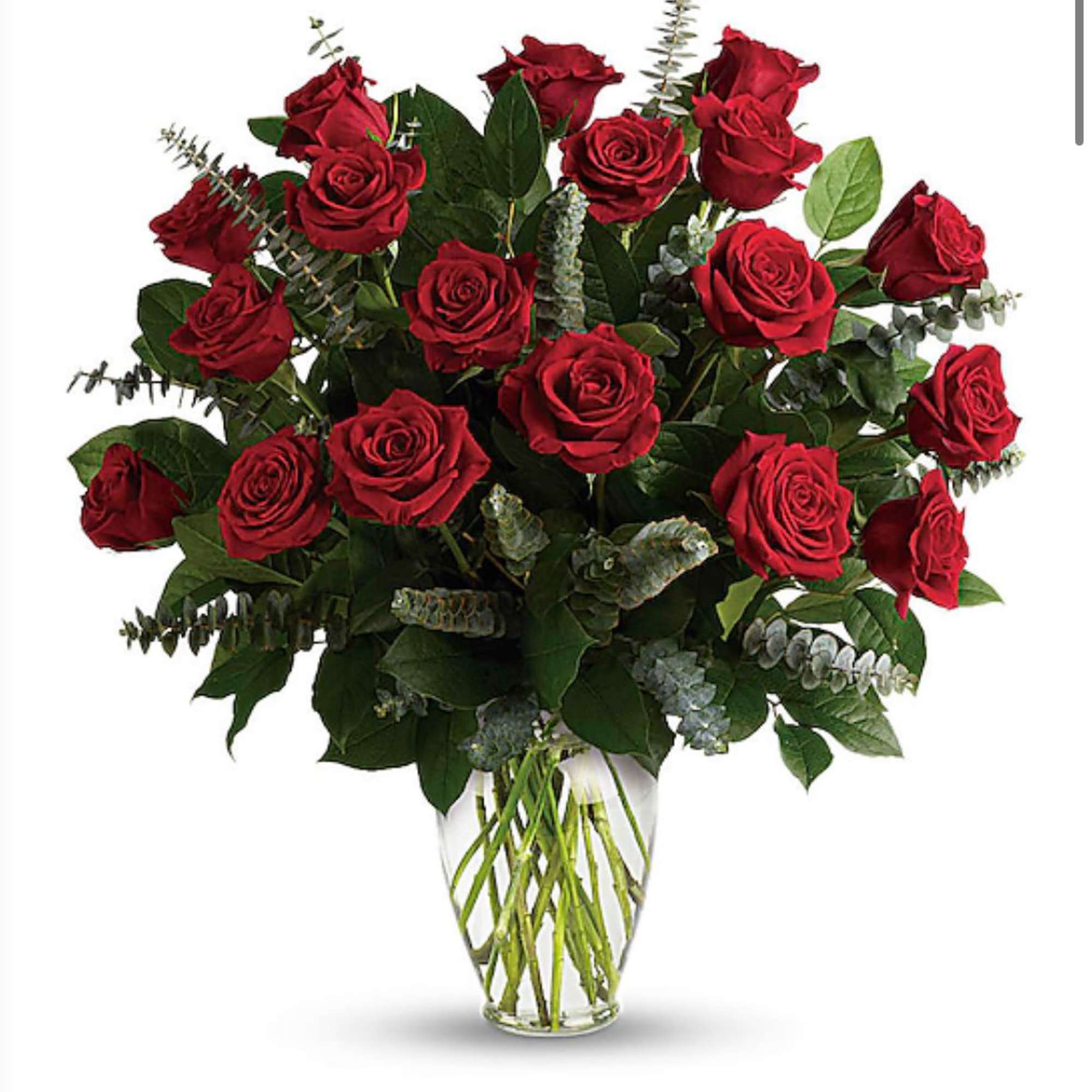 Bouquet of red roses in a clear glass vase