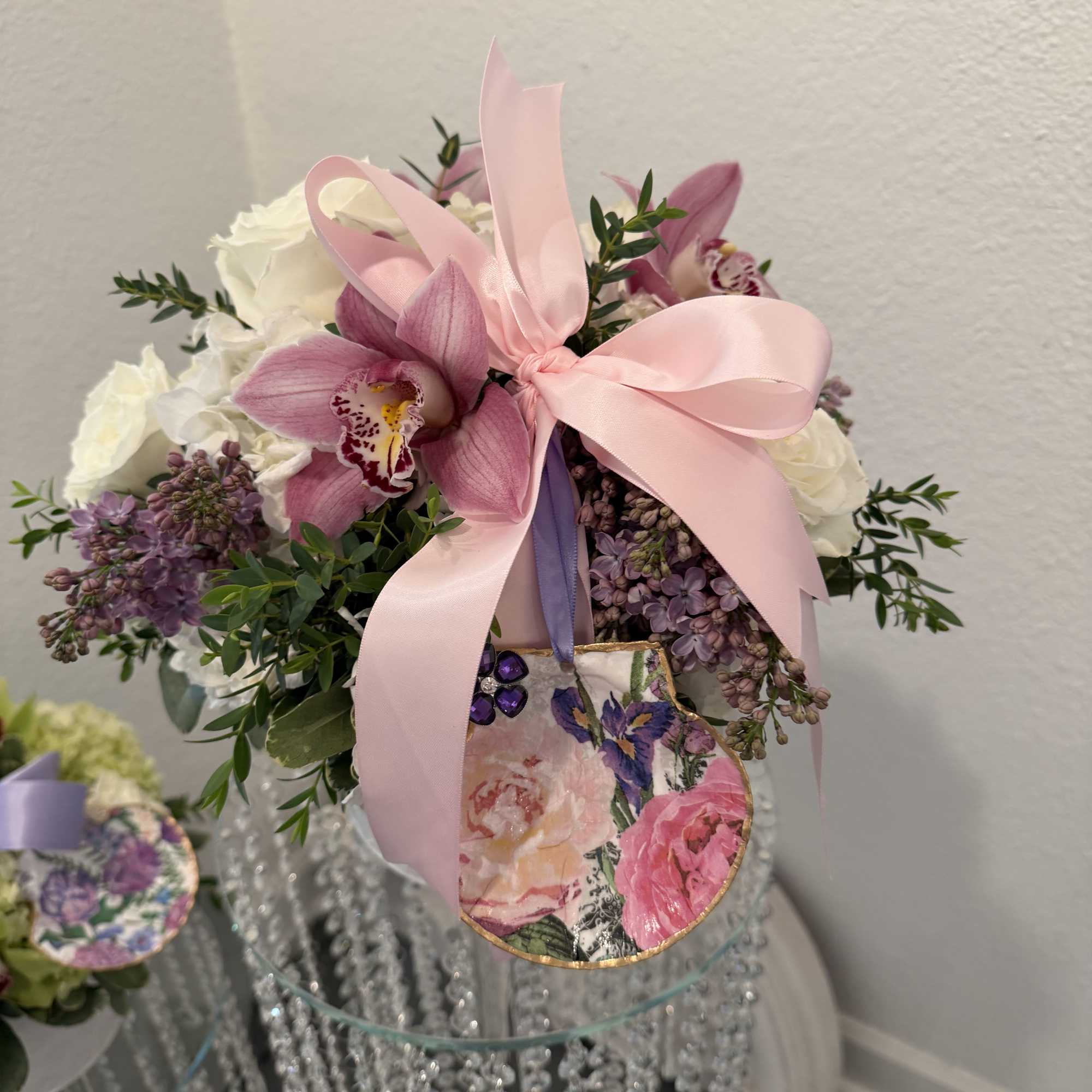 A luminous mix of pink, white, and purple florals makes this flower