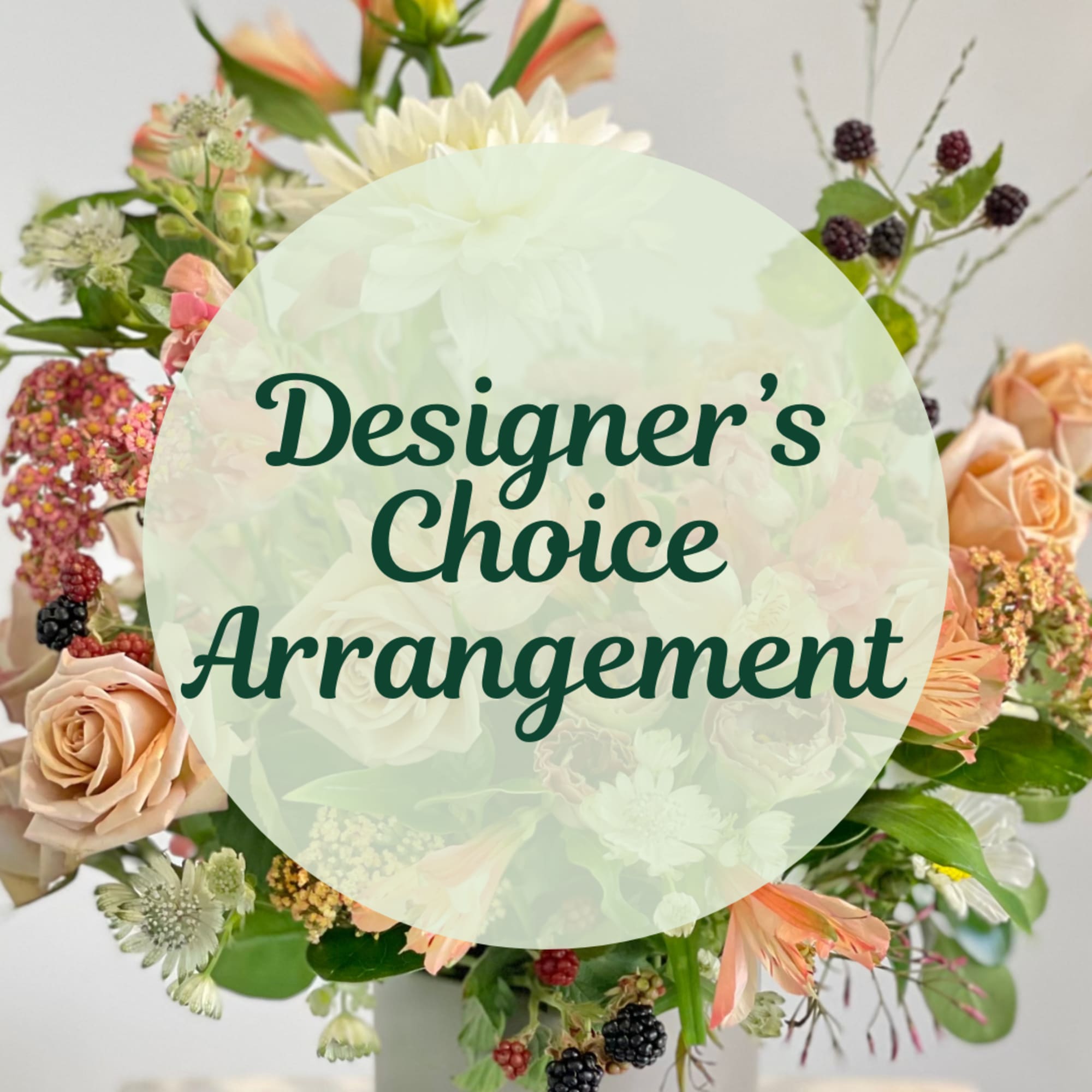 Mixed peach and white flower arrangement in a vase with Designer's Choice text overlay