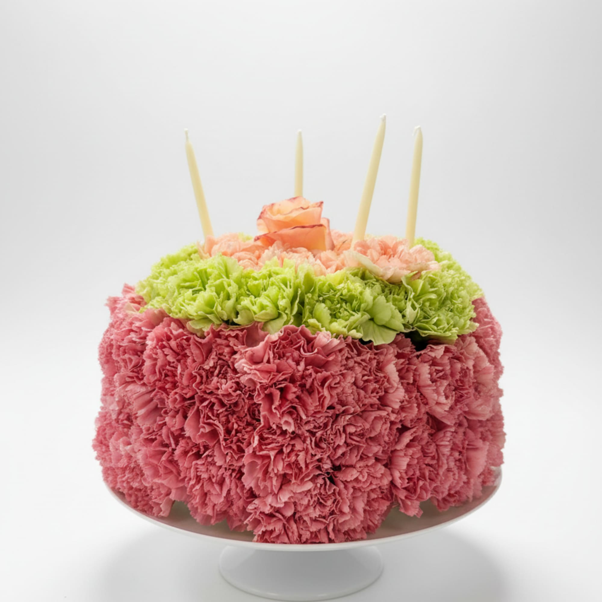 This custom floral cake is make with long lasting fluffy carnations. Can