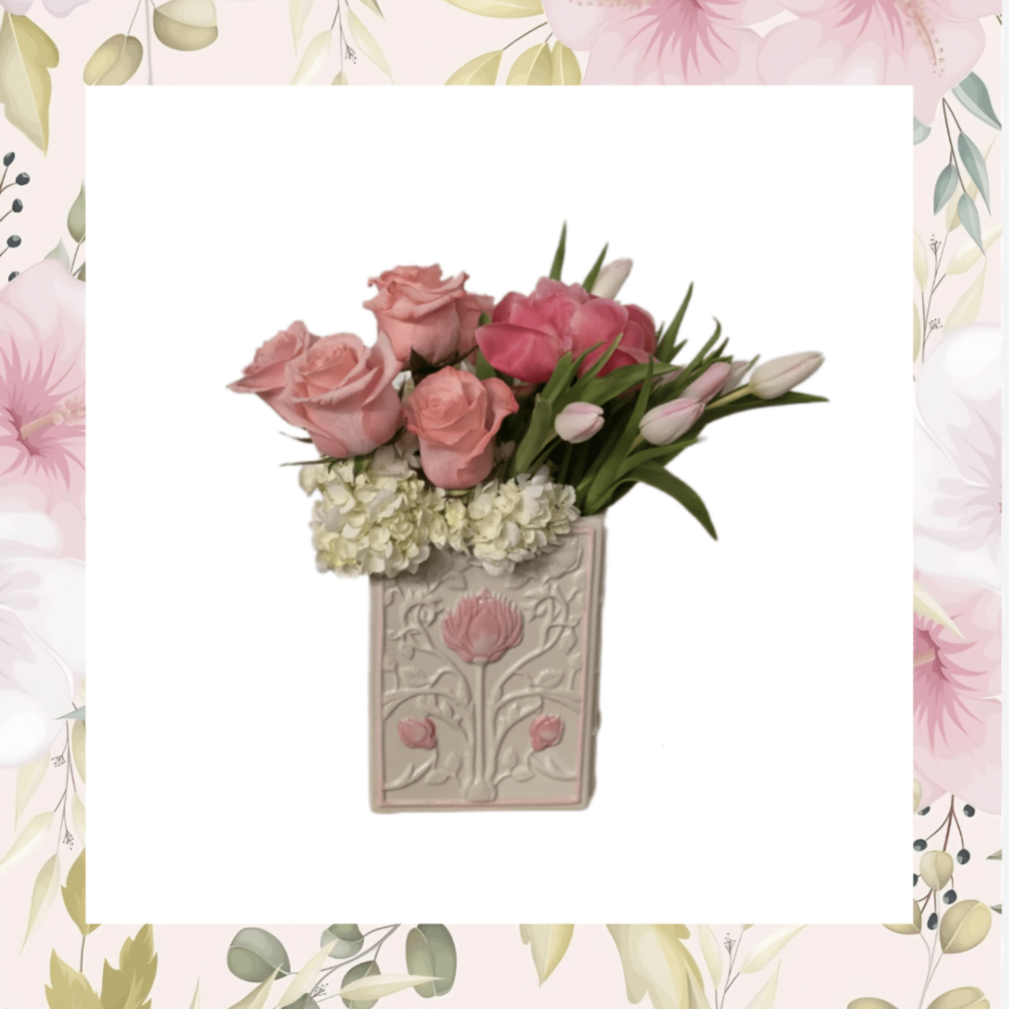 Pink roses and tulips arranged in a decorative vase