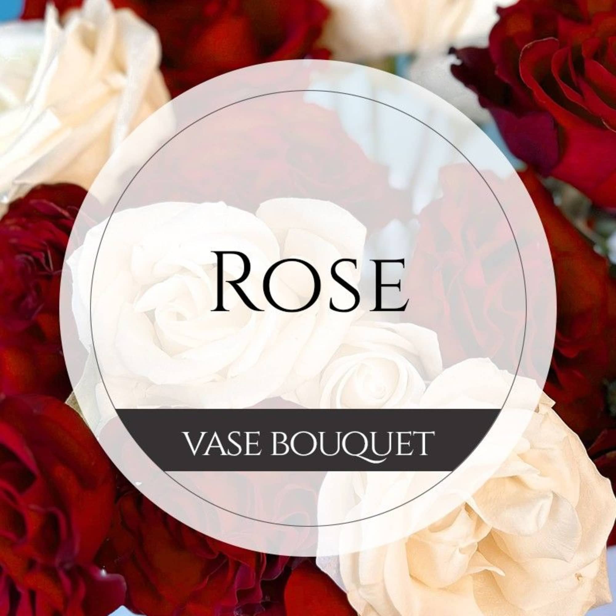 White and red roses arranged in a vase bouquet