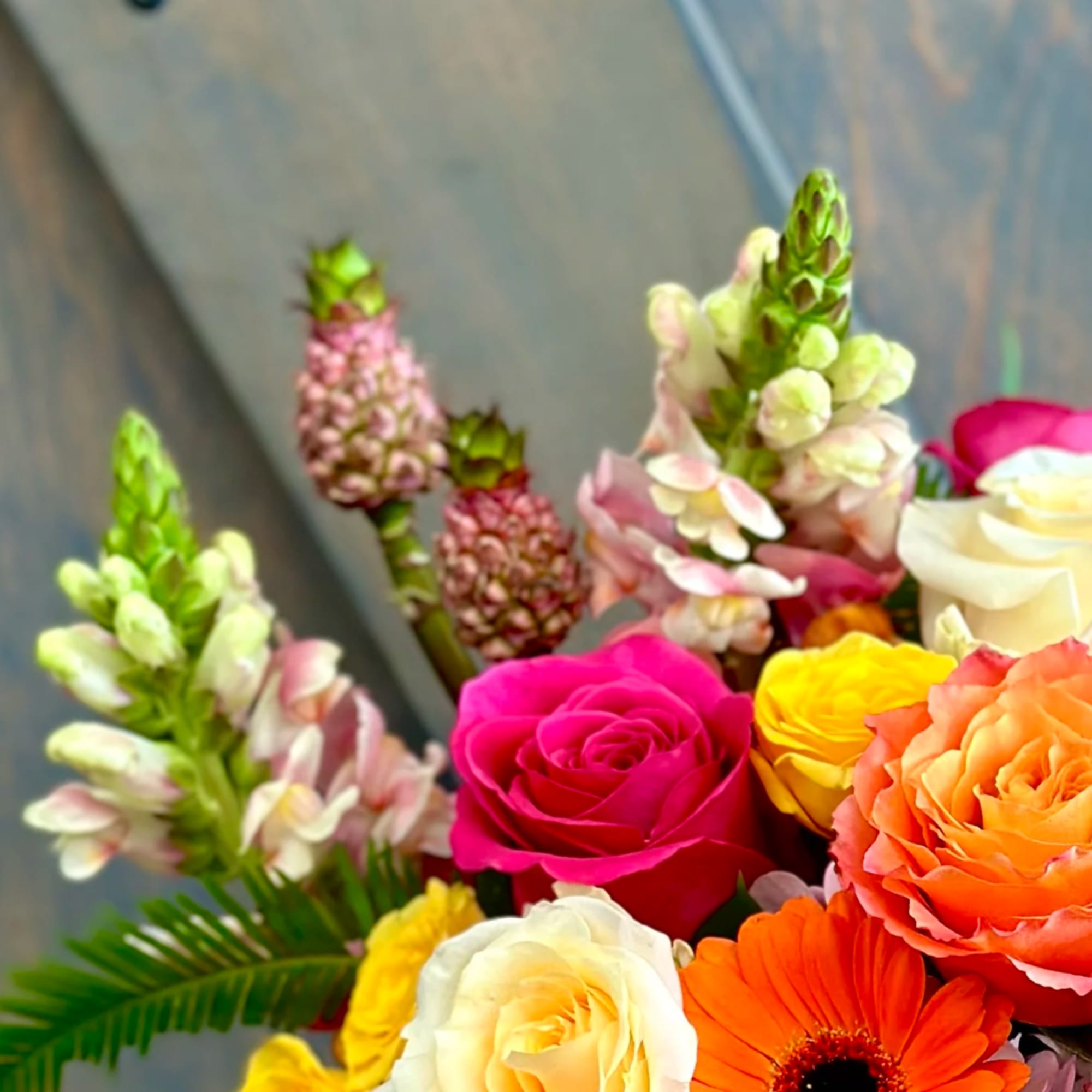 All aboard this tropical and fun arrangement, and yes there are actual