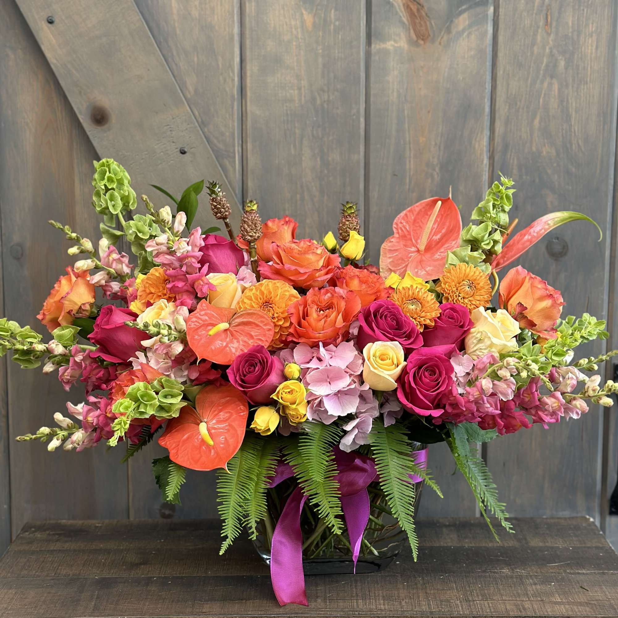 All aboard this tropical and fun arrangement, and yes there are actual