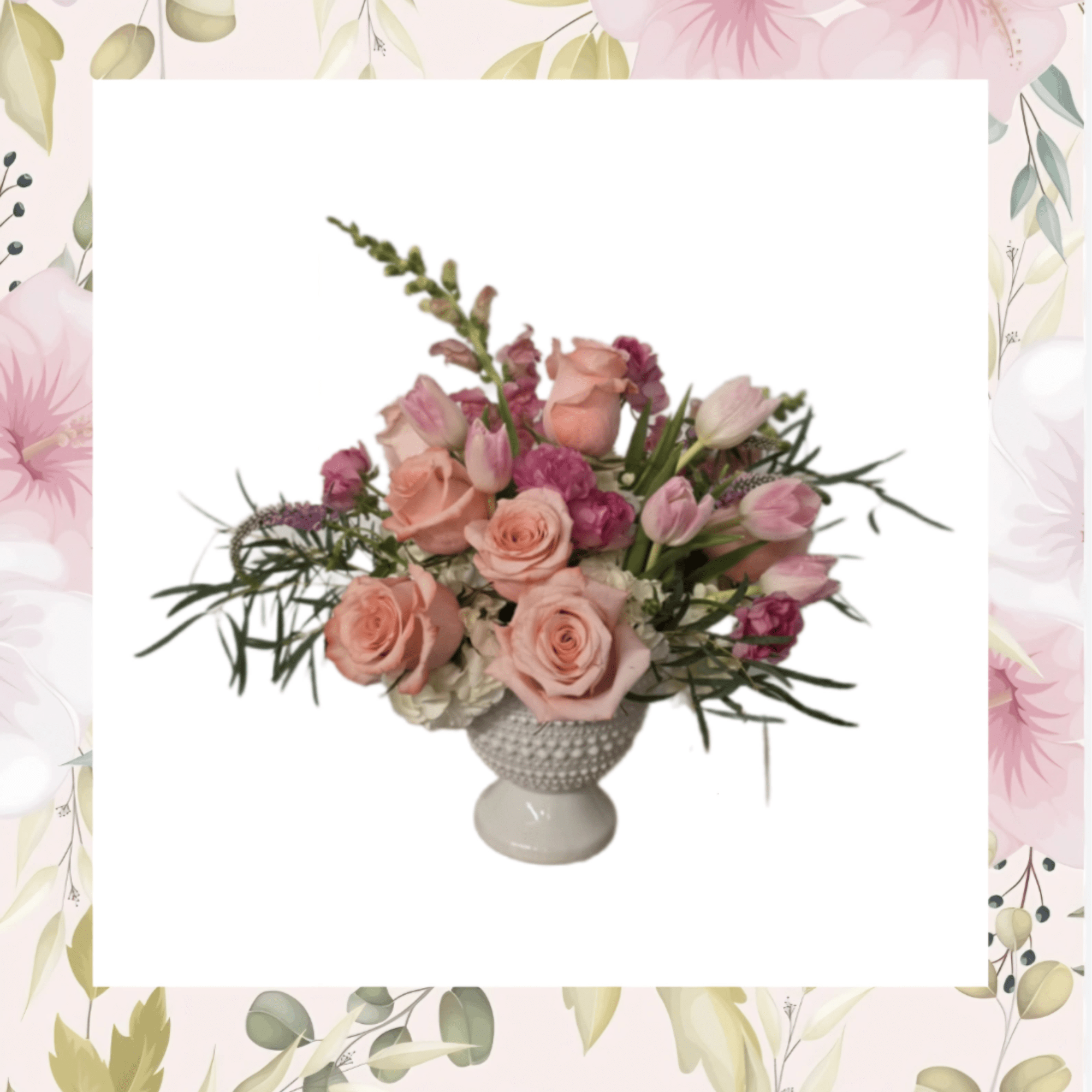 Pink roses and tulips arranged in a white pedestal vase