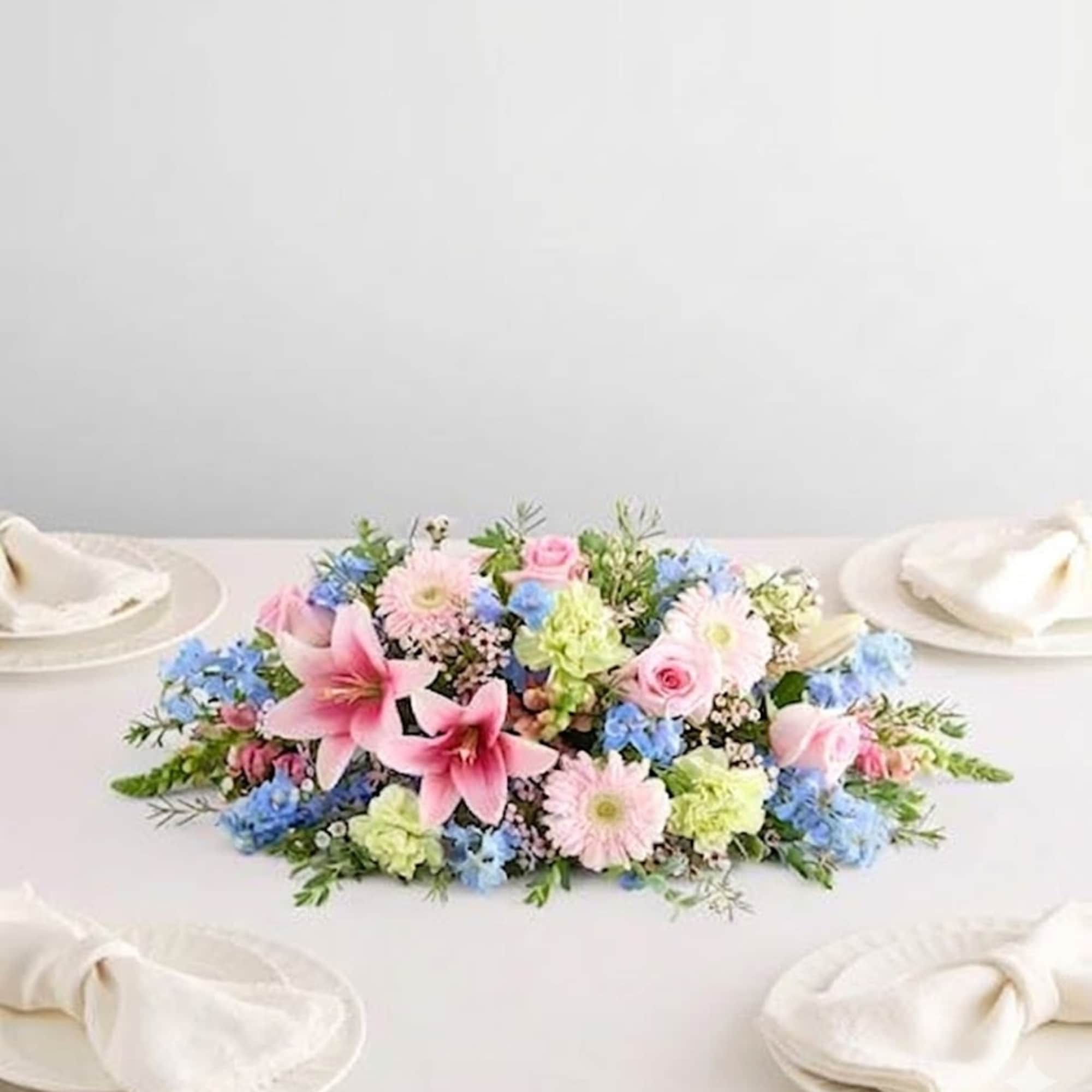  Pet Friendly?
No This arrangement contains Oriental Lilies, which are highly toxic
