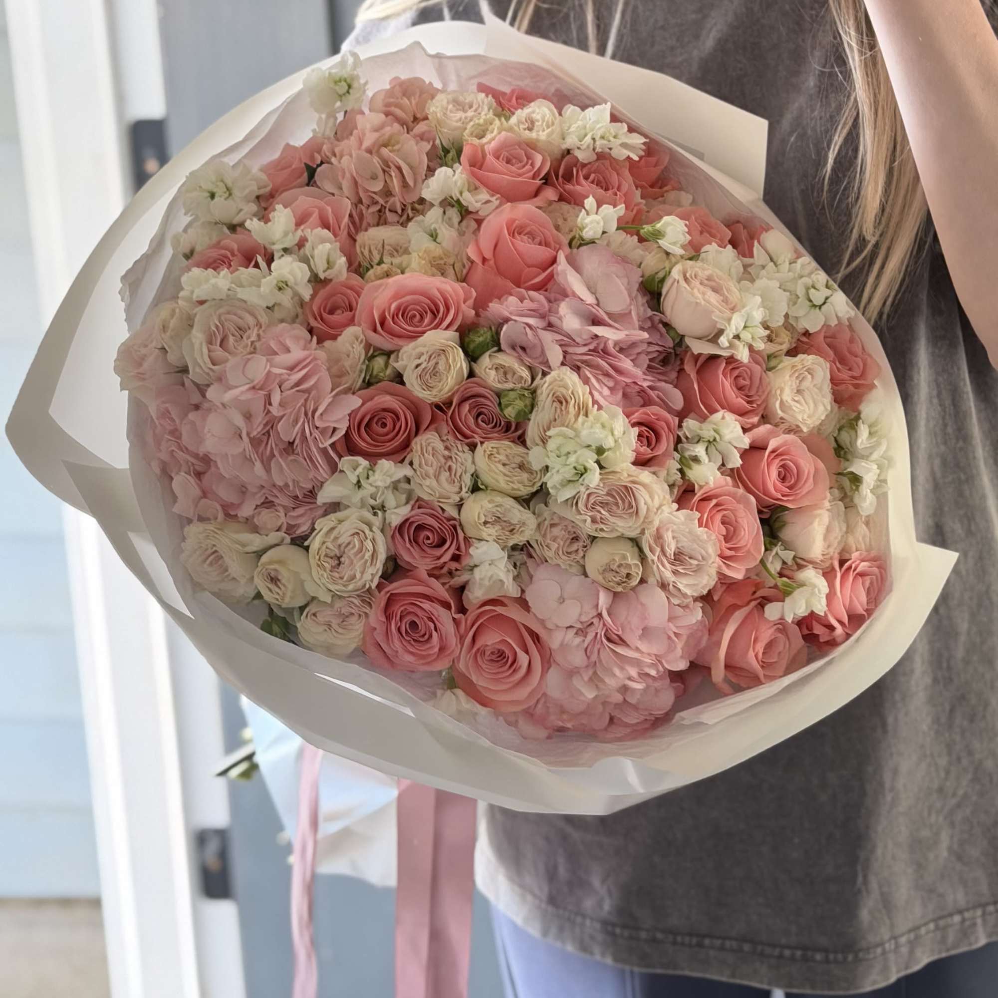 An abundant, garden-style bouquet designed to feel soft, romantic, and effortlessly luxurious.