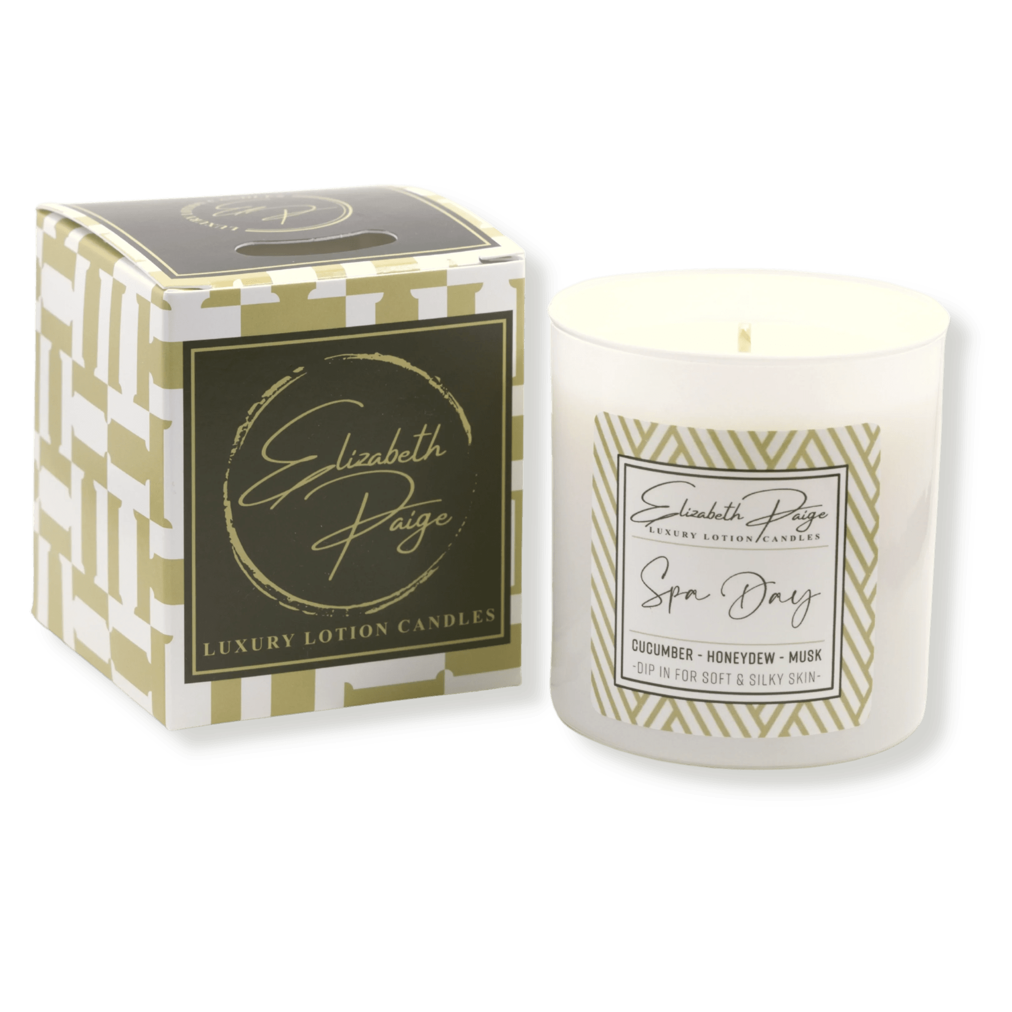 White jar candle labeled Spa Day with matching patterned box beside it