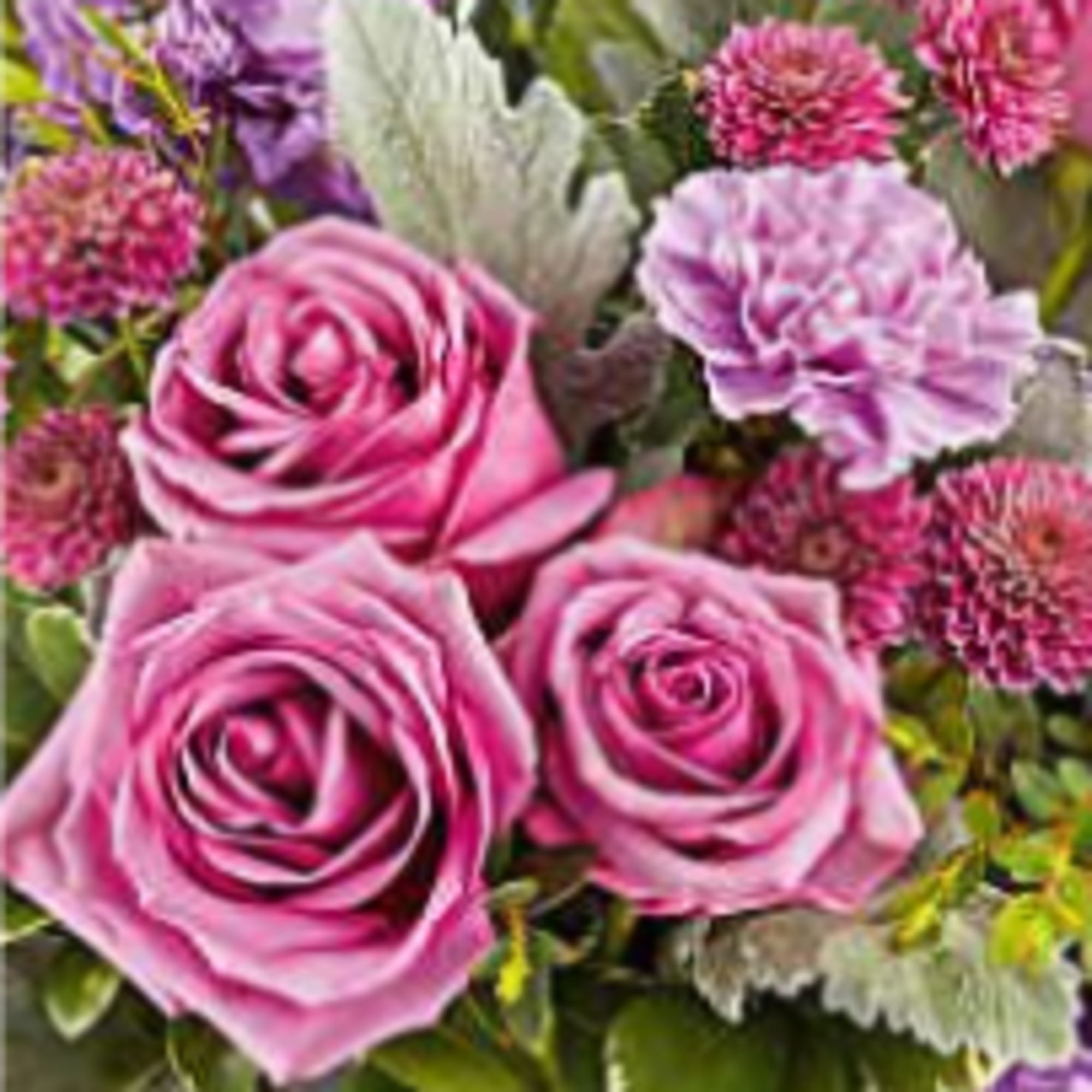 Pink roses and purple flowers in a mixed bouquet