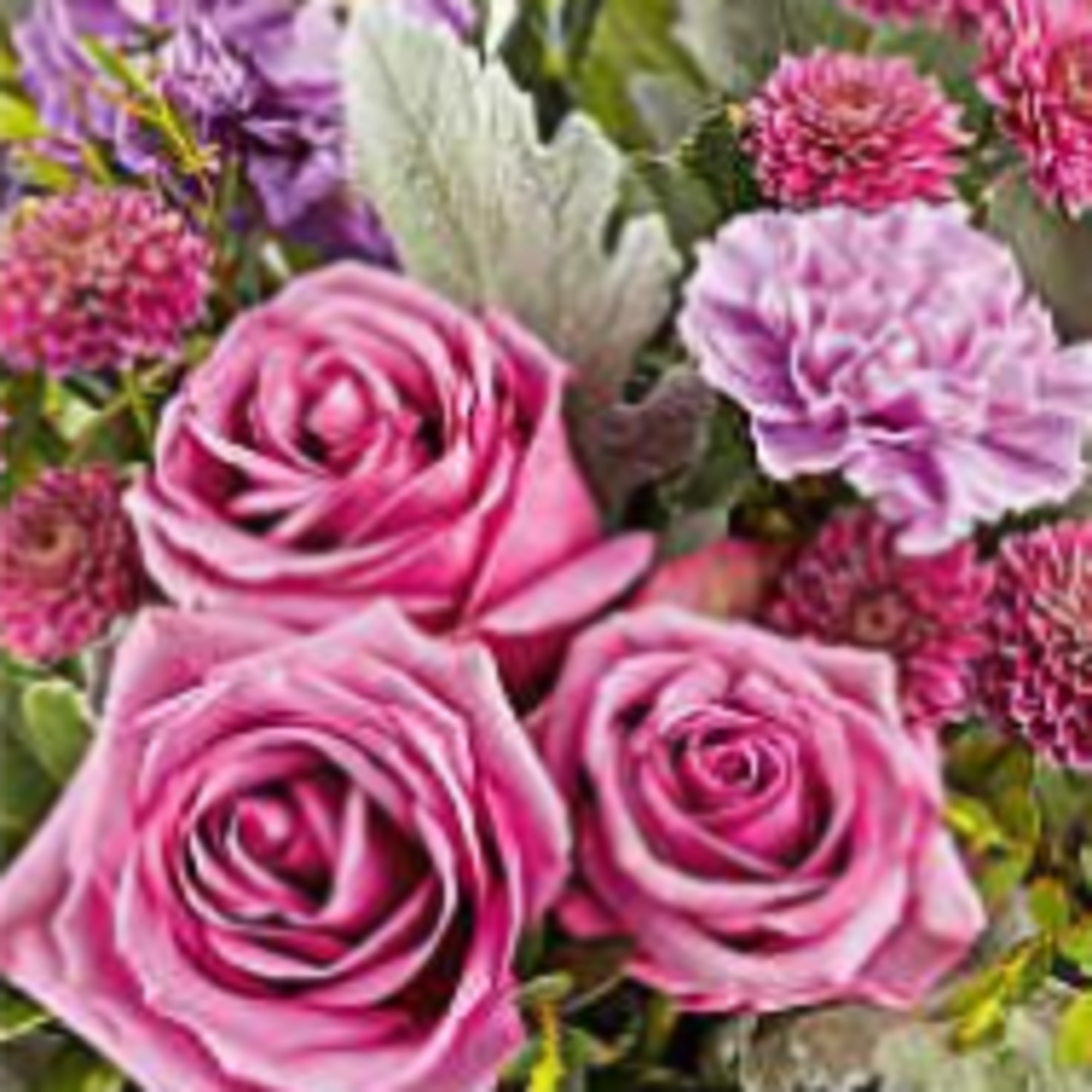 A beautiful arrangement of fresh cut flowers in a vase. Colors will