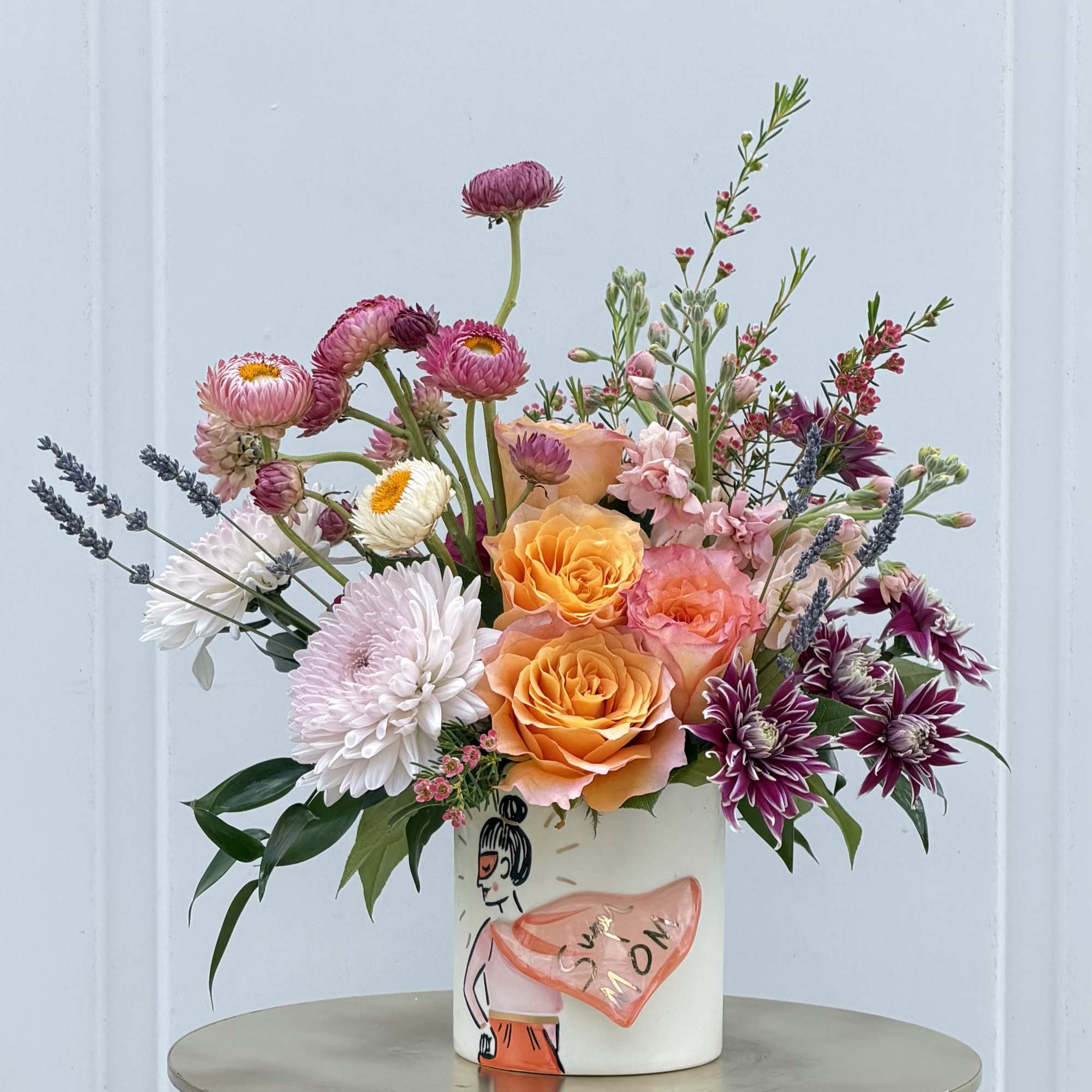 Celebrate her with a bouquet as vibrant and beautiful as she is.