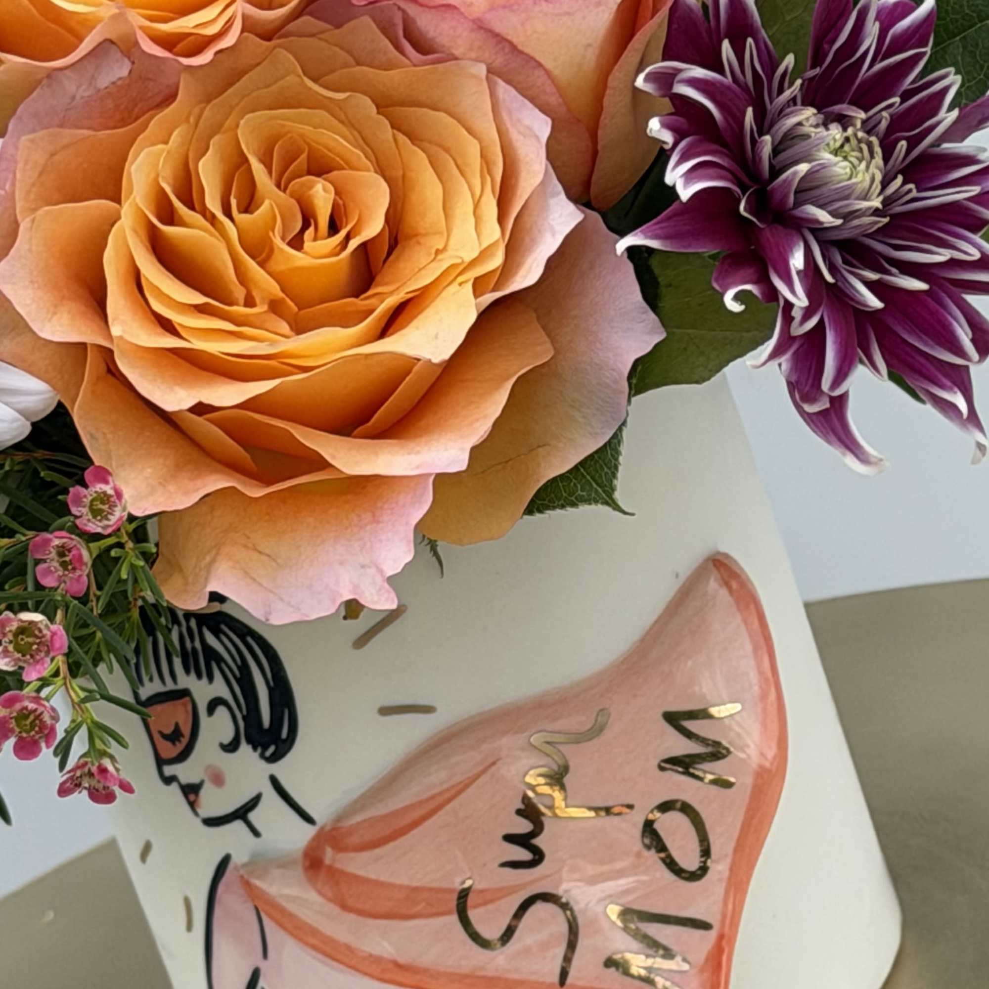 Celebrate her with a bouquet as vibrant and beautiful as she is.