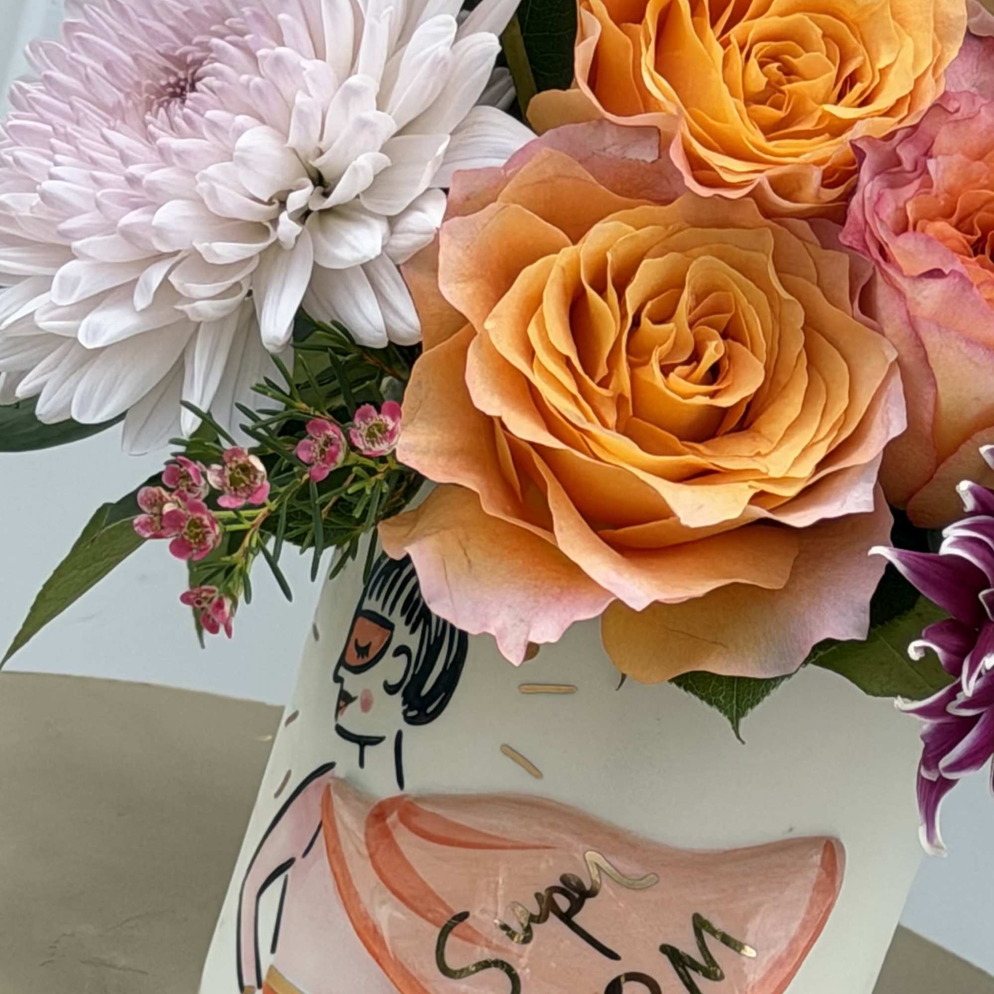 Celebrate her with a bouquet as vibrant and beautiful as she is.