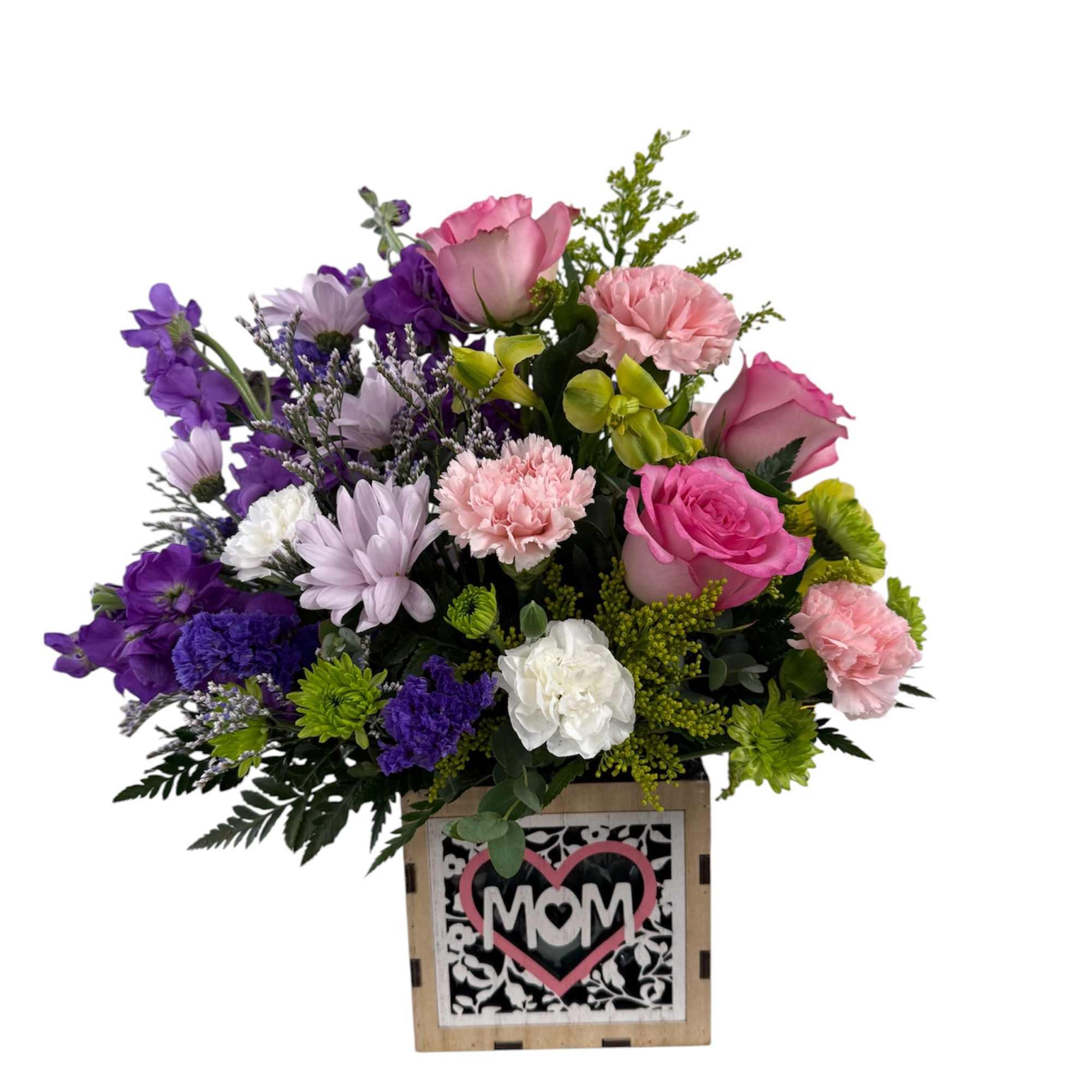 Soft pink roses and ruffled carnations mingle with pale lavender and white