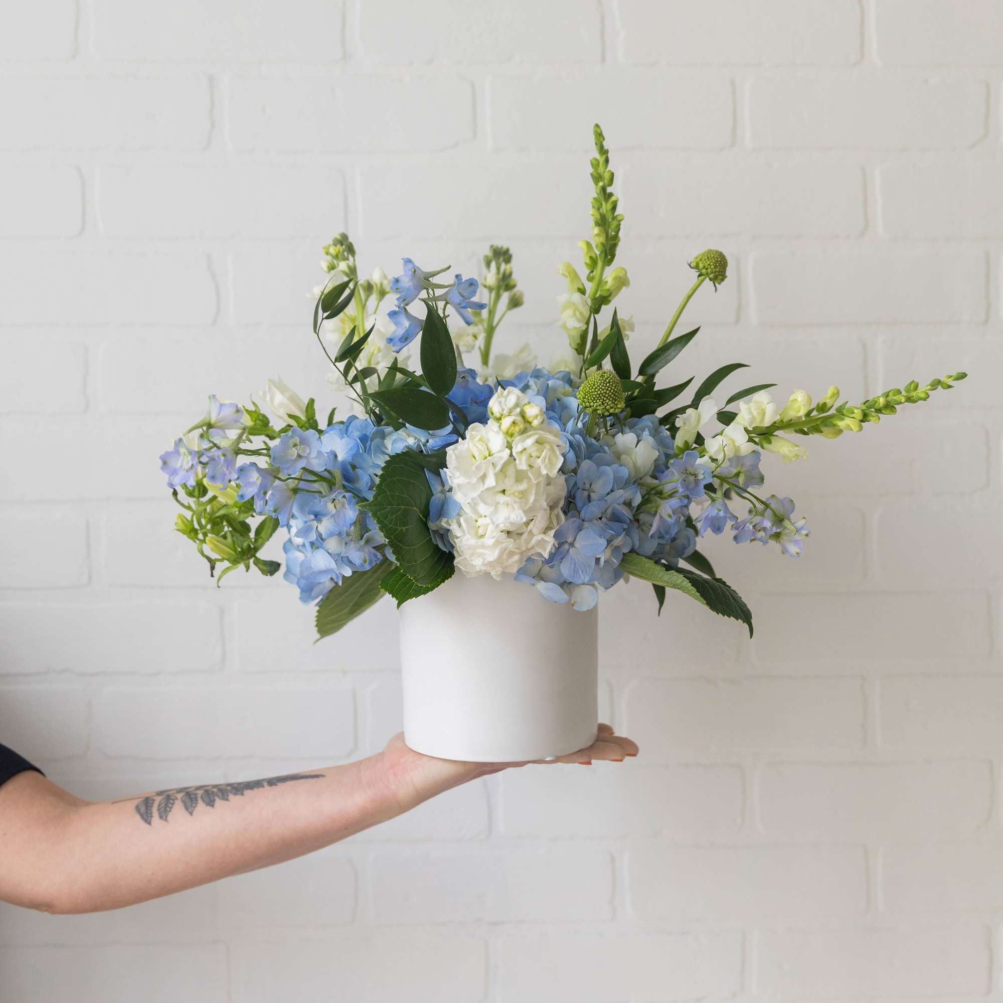 A soft, garden-inspired arrangement designed to feel as special as she is.