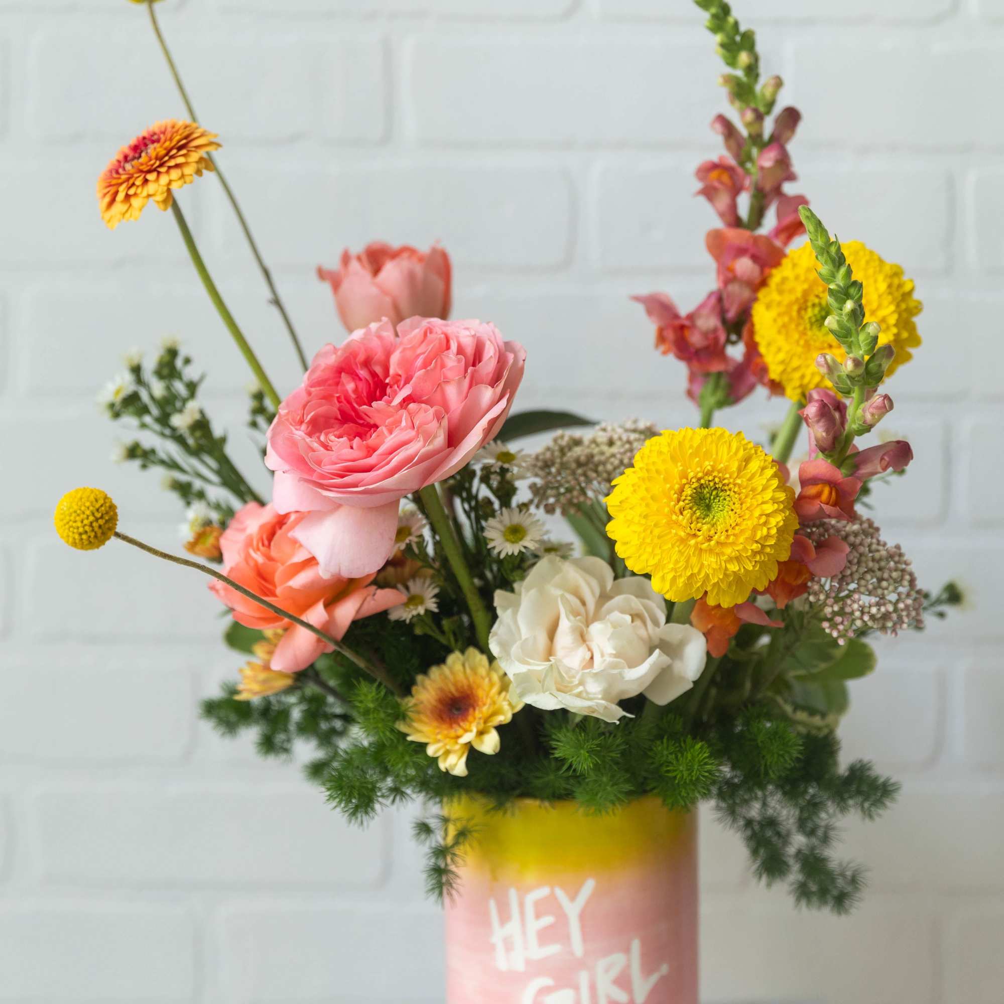 Bright, playful, and full of personality&mdash;just like her. This cheerful arrangement features