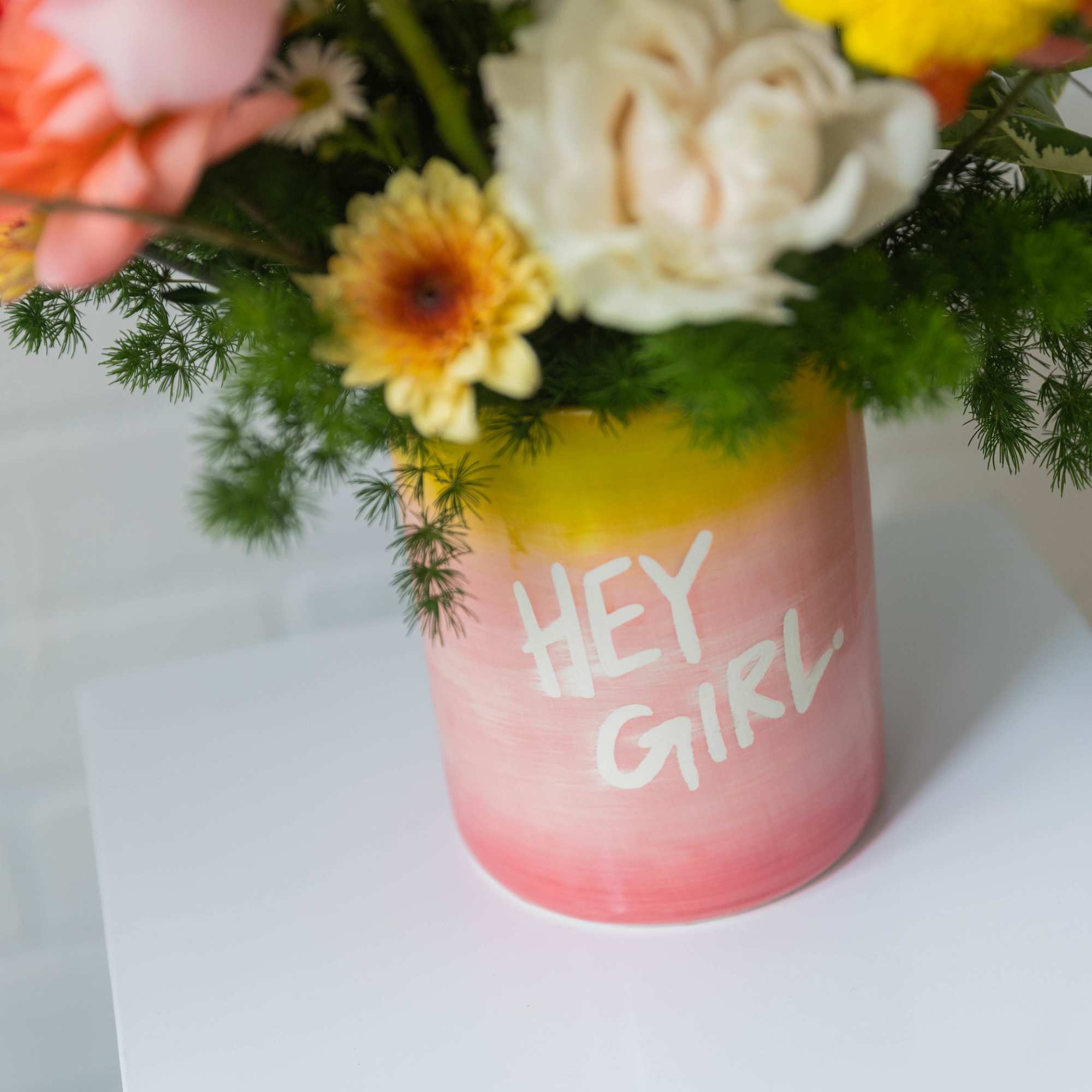 Bright, playful, and full of personality&mdash;just like her. This cheerful arrangement features