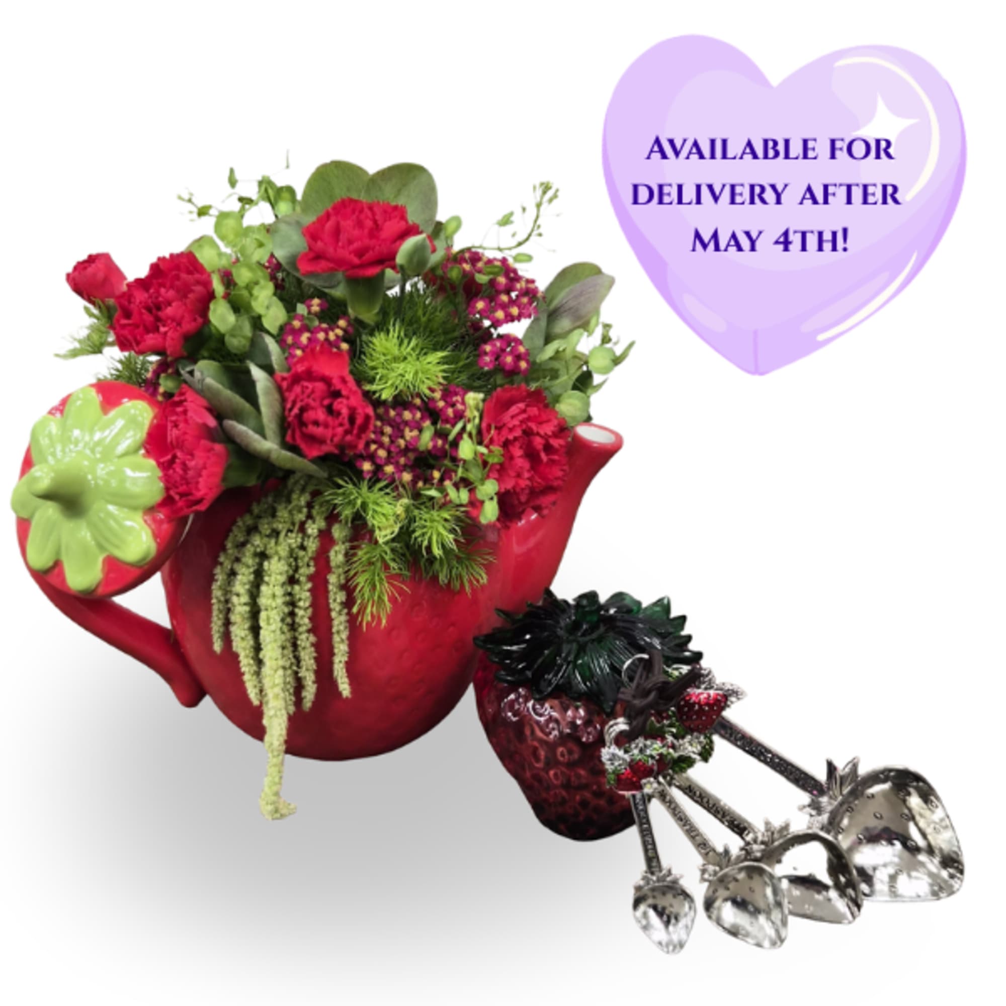 A bright strawberry-shaped teapot bursting with cheerful color-this flower arrangement in a