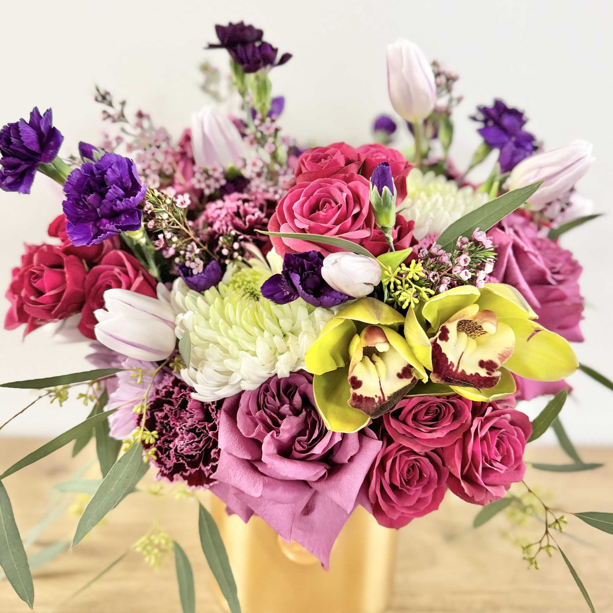 A one-of-a-kind arrangement designed with the freshest seasonal blooms, thoughtfully crafted to