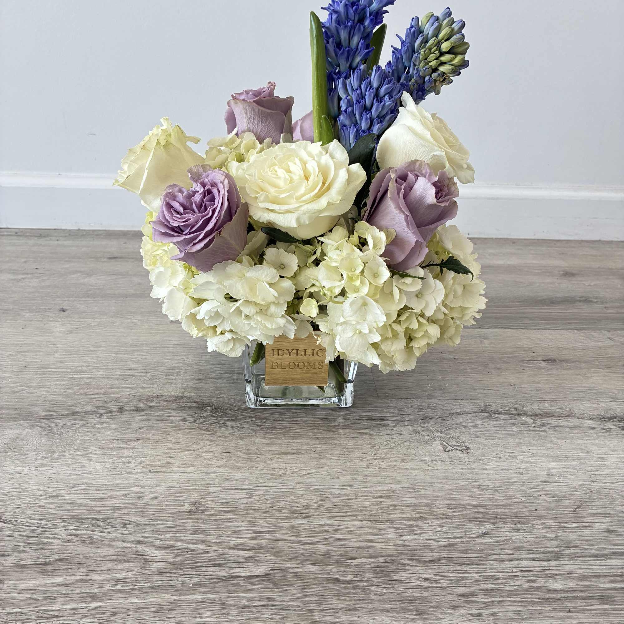 Lavender love is a delicate blend of creamy white hydrangeas, elegant ivory